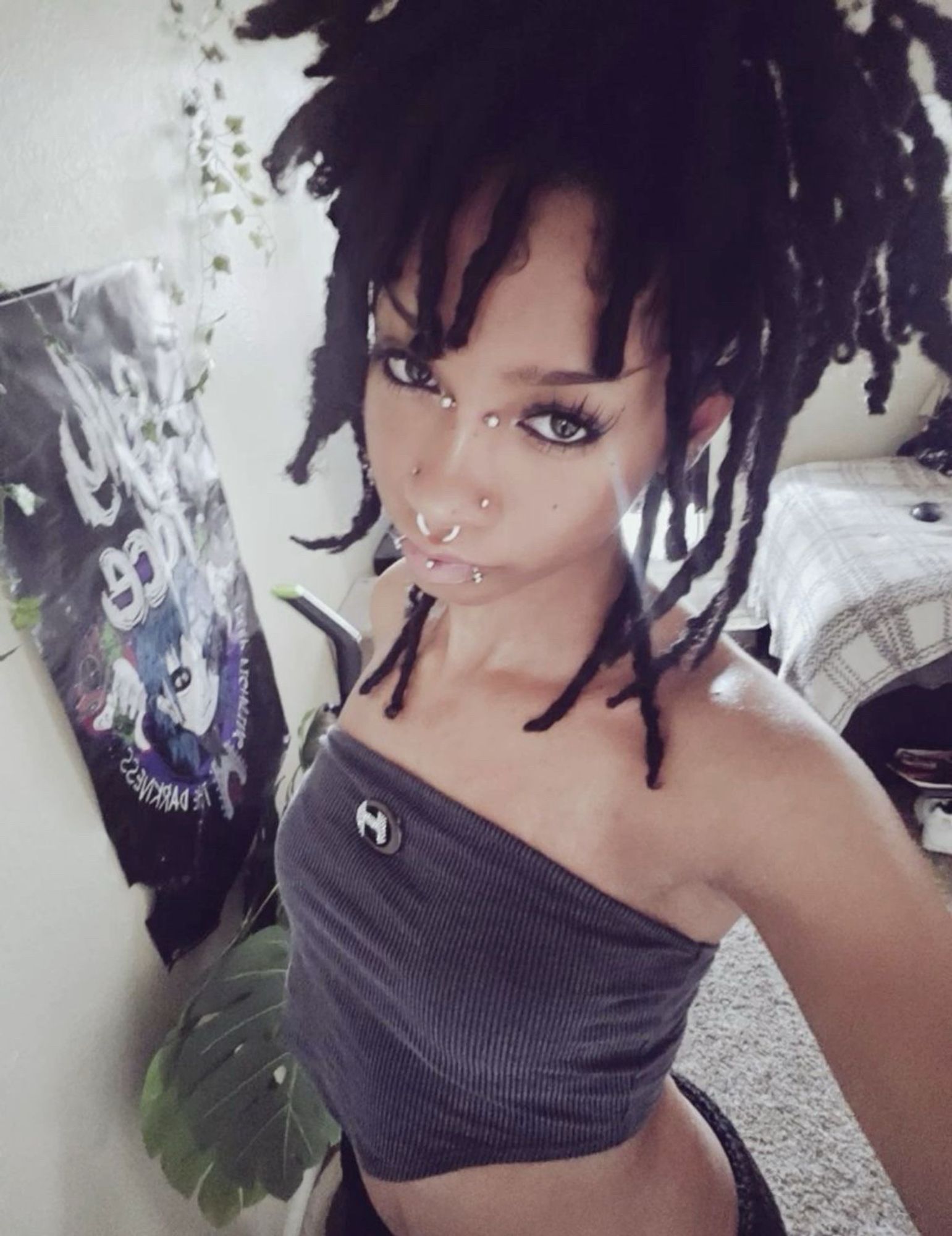 Brown emo/goth girl with dread locs