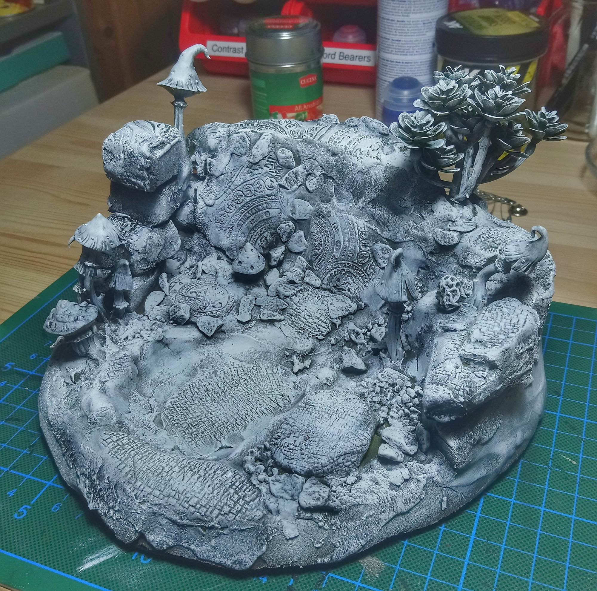 Primed and highlighted diorama. No colour yet.