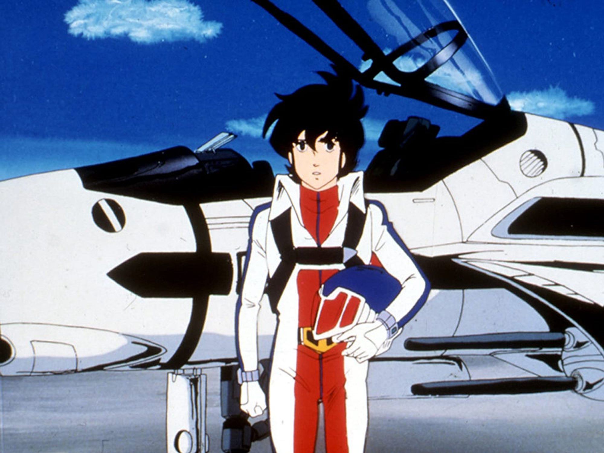 Still from the Robotech franken-anime, with Rick Hunter in flight gear standing in front of a cockpit. Looks pretty awesome tbh