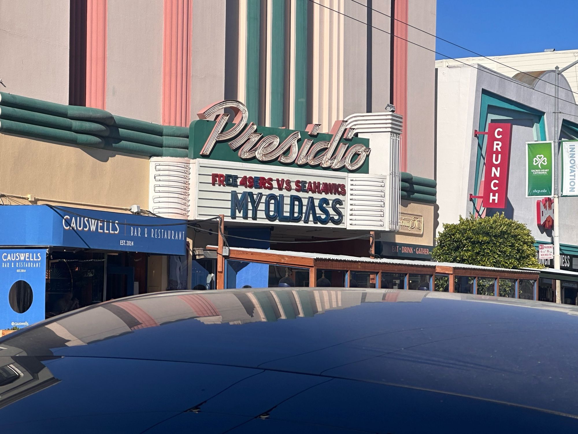 Presidio movie theater marquee with big letters announcing MY OLD ASS