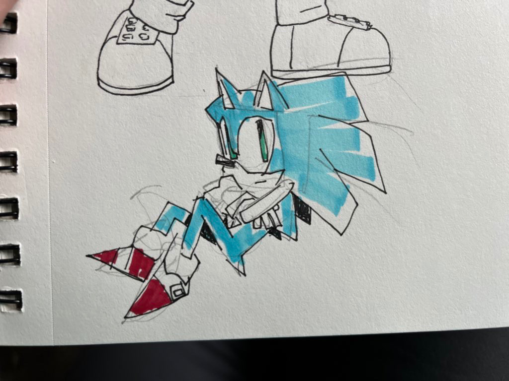 Sonic the hedgehog sketch in a sketchbook