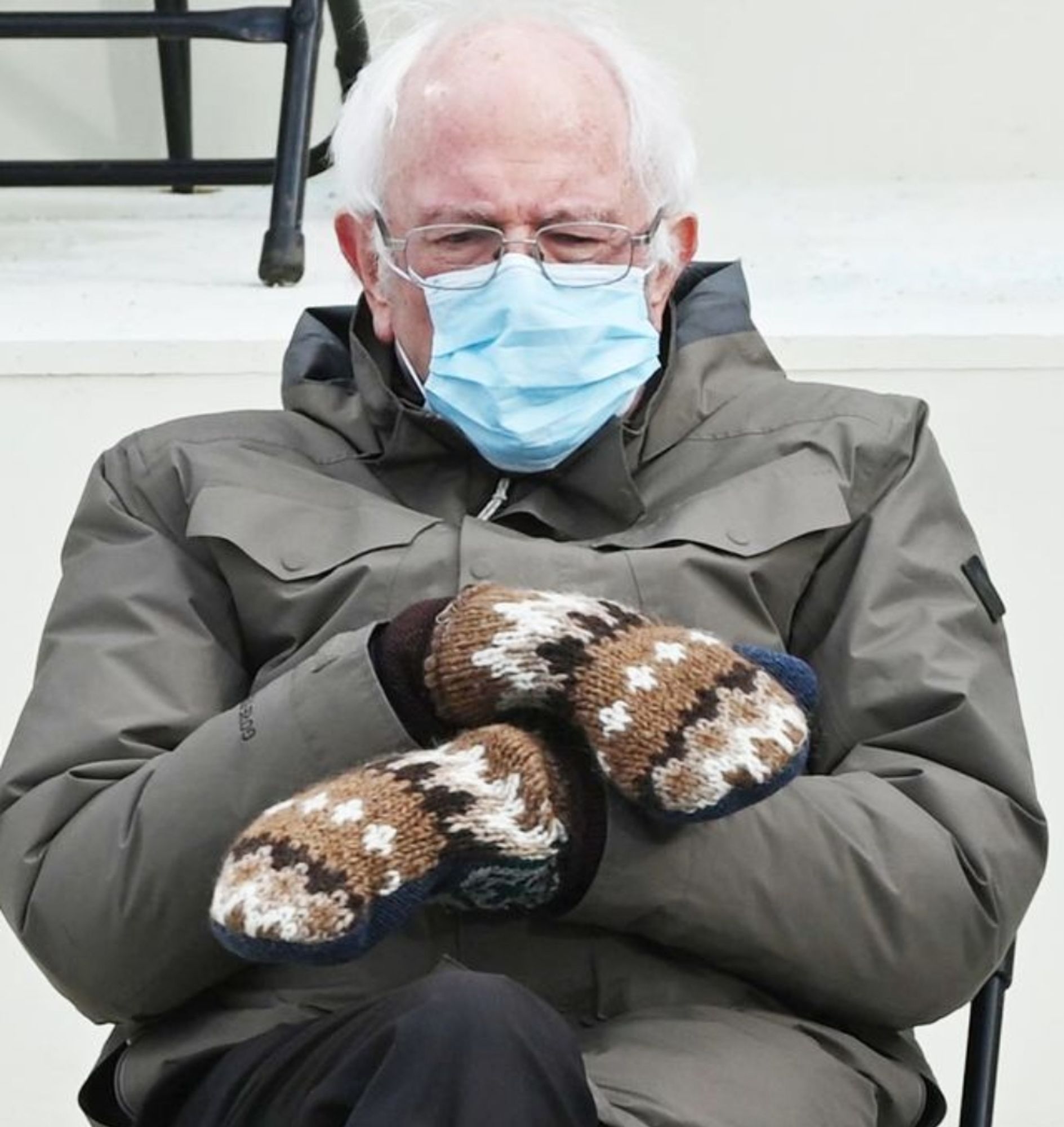 Bernie Sanders in Burton coat and handmade mittens.