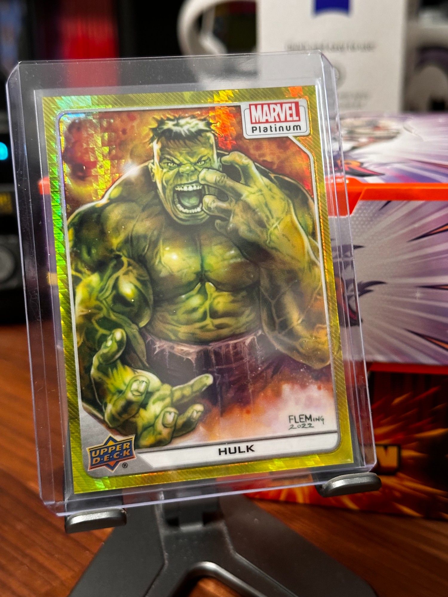 Upper Deck Marvel Platinum - 
Hulk - posed with his left hand up to his face, his right hand stretched out and appears to be about to grab the view.
Yellow Spotlight parallel (yellow holofoil background)