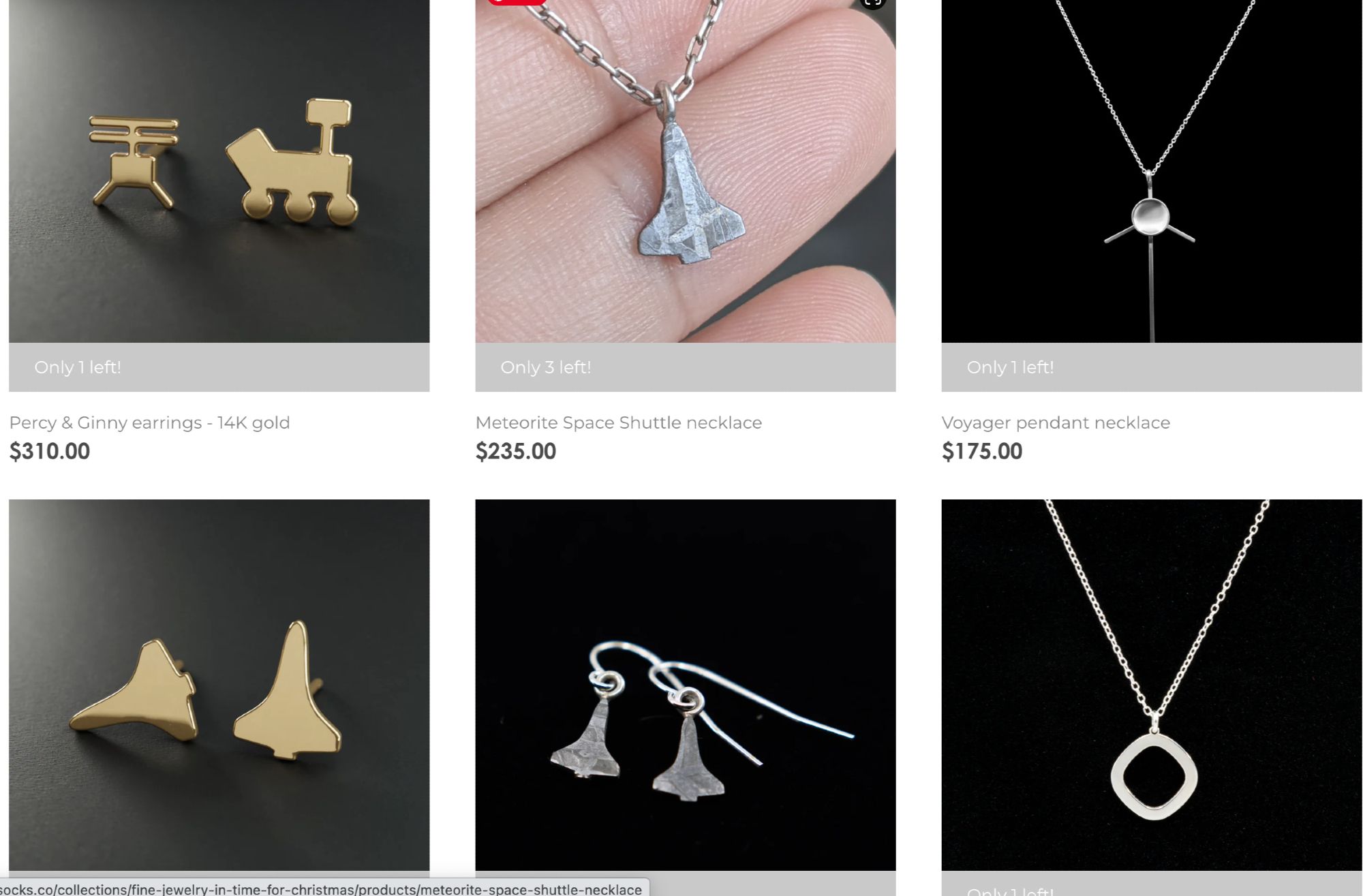 screenshot of the ScienceSocks website showing the following jewelry pieces: percy & ginny studs in gold, meteorite space shuttle pendant necklace, voyager necklace, space shuttle gold studs, meteorite space shuttle earrings.