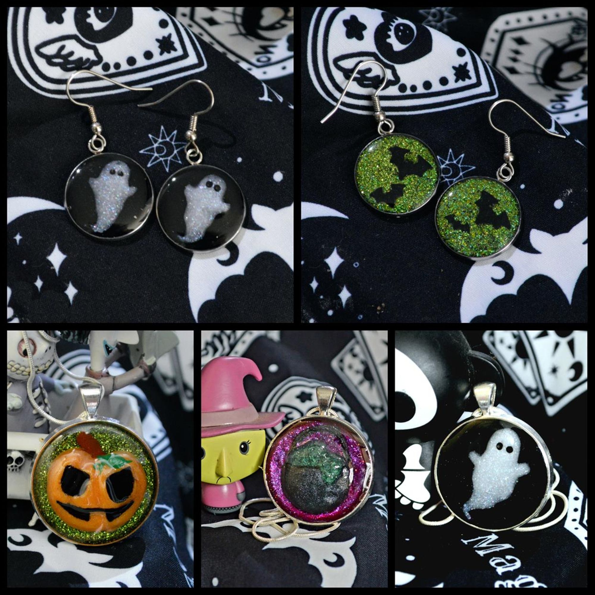 Five images arranged in a grid, with two on the top row and three on the bottom. All of the images feature jewellery against a black and white occulty looking pattern fabric. The top two images are, from left to right; A pair of small dangle earrings with little handmade ghosts under resin, and a pair of small dangle earrings with tiny black bats against a bright green background. The bottom row of images are from left to right; A pendant featuring a large grinning orange Jack 'O' Lantern against a green background, a pendant featuring a large grey cauldron with green iridescent potion bubbling up over the rim against a bright purple background, and a pendant with a small white resin ghost against a black background.