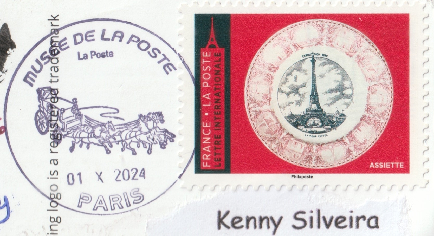 Stamp and cancellation from Paris France, the stamp showcasing the Eiffel tower and celebrating international letters. The cancellation is from Musee de la Post (Museum of Posts) and is cancelled on 01 October 2024 which is World Postcard Day.