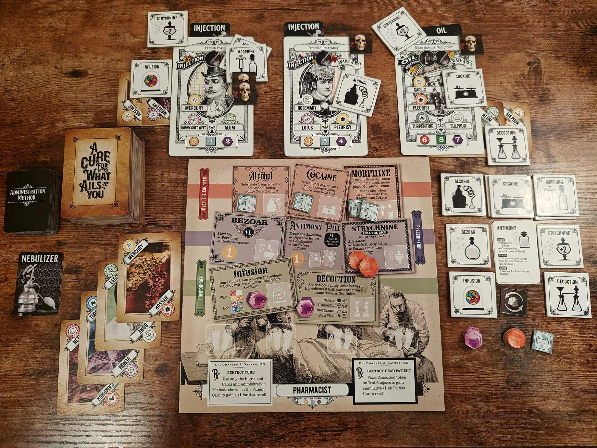 A board game play area for the Pharmacist role in the game "A Cure For What Ails You." Three patients are being treated with various drugs such as Morphine, Alcohol, and Cocaine, which was accurate for medical treatments in the late 1800s.