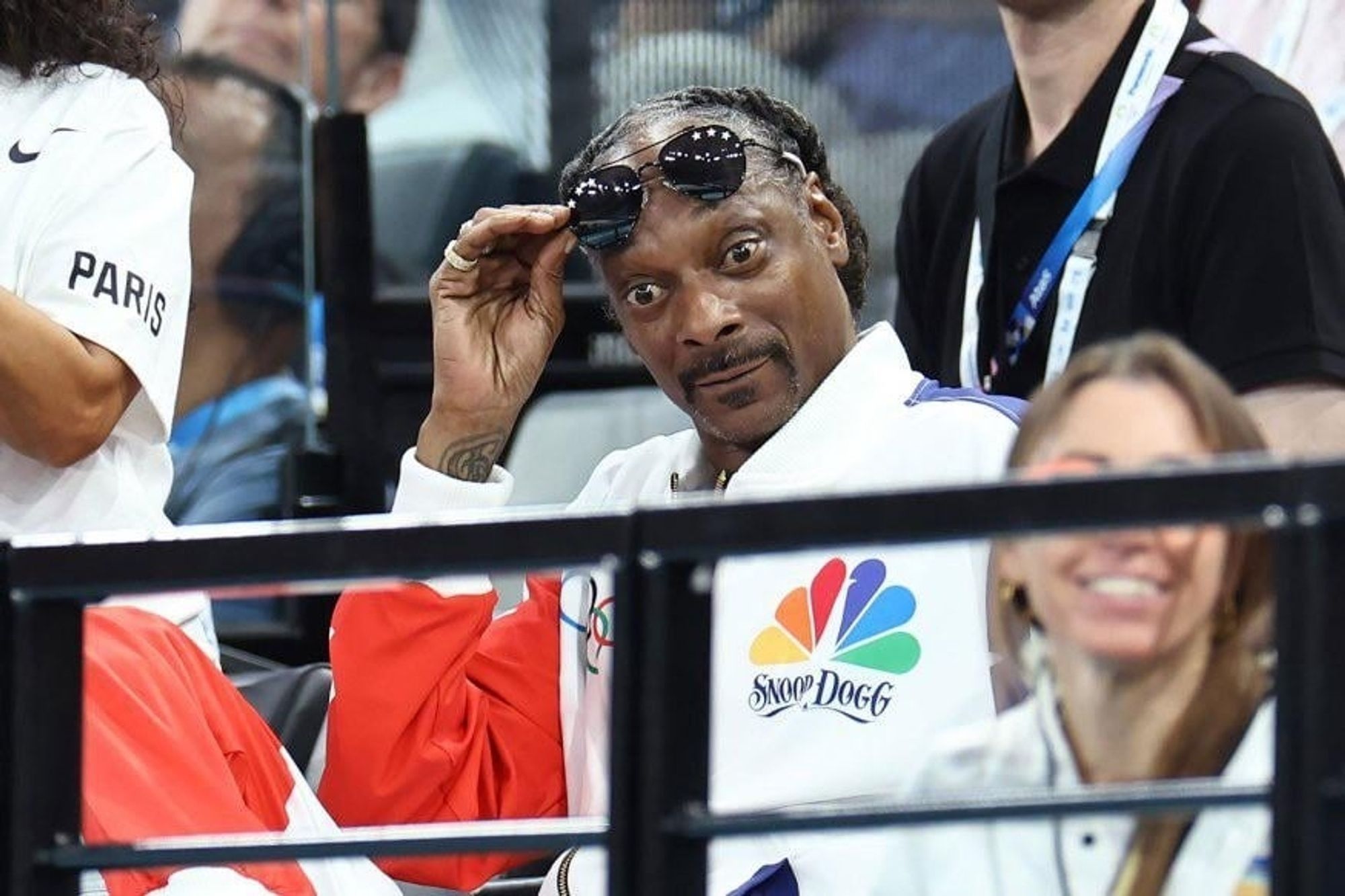 Snoop Dogg, looking perplexed with eyes wide open