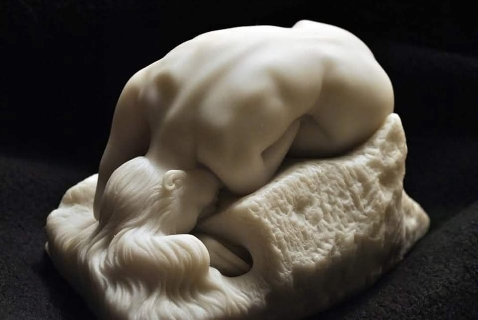 Also known as "The Spring", this sculpture was purchased by the Musée du Luxembourg, Paris - the museum reserved for works by living artists - after it was shown at the Salon in 1890.

Adapting a mythological theme – the daughters of Danaos, or Danaïds, were made to fill up a bottomless barrel with water in punishment for killing their husbands on their wedding night. 

Rodin, above all constructed a feminine landscape by highlighting the curve of the back and neck.

Instead of representing the Danaïd in the act of filling the barrel, as in conventional iconography, Rodin depicts her despair as she realizes the pointlessness and absurdity of her task. Exhausted, she rests her head "like a huge sob" on her arm, while her outspread "liquid" hair, to quote Rilke, merges with the water from her overturned vase. 

The highly polished finish on the marble, carved by Jean Escoula, is in keeping with Rodin's love of luminous modelling, without any shadowy hollows.