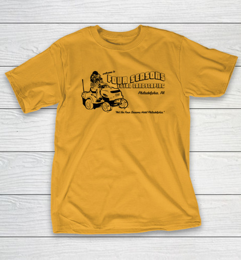 yellow 4 seasons landscaping t shirt with mascot gritty riding a lawnmower