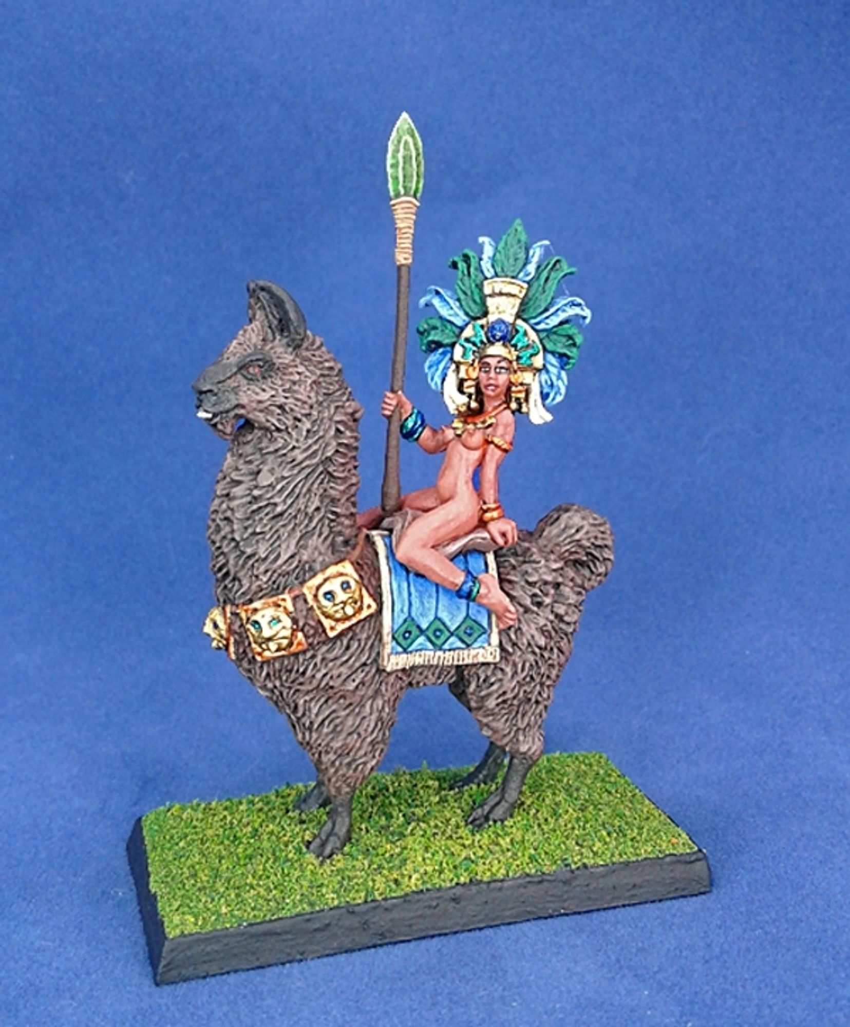 28mm fantasy gaming sculpture of a very stylised naked queen astride a goofy giant llama.