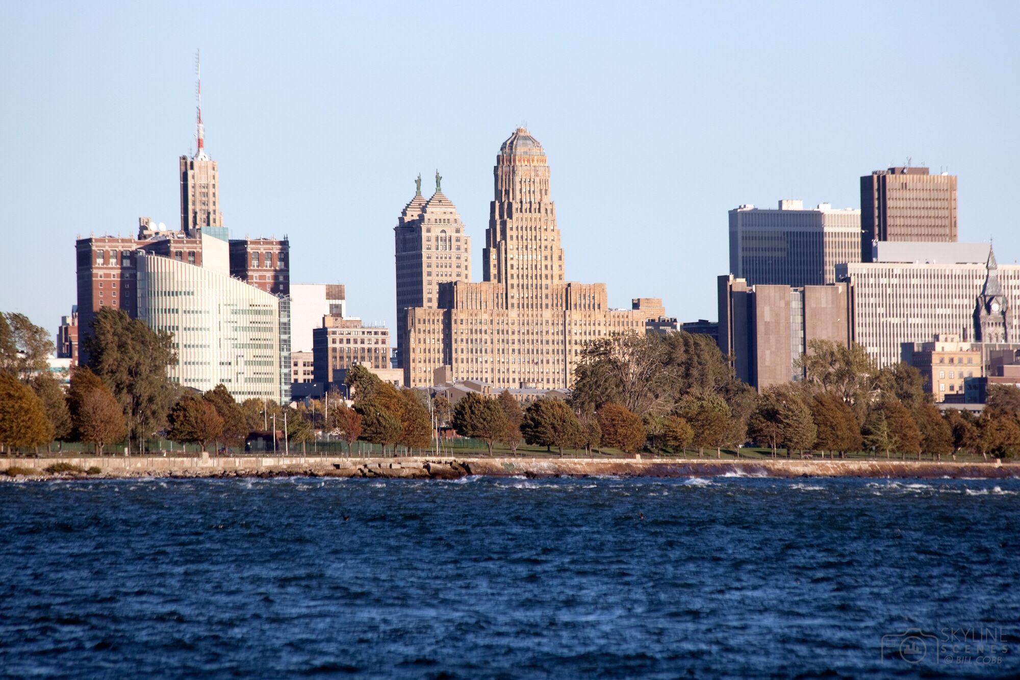 Picture of the Buffalo skyline from the river with City Hall in the middle.