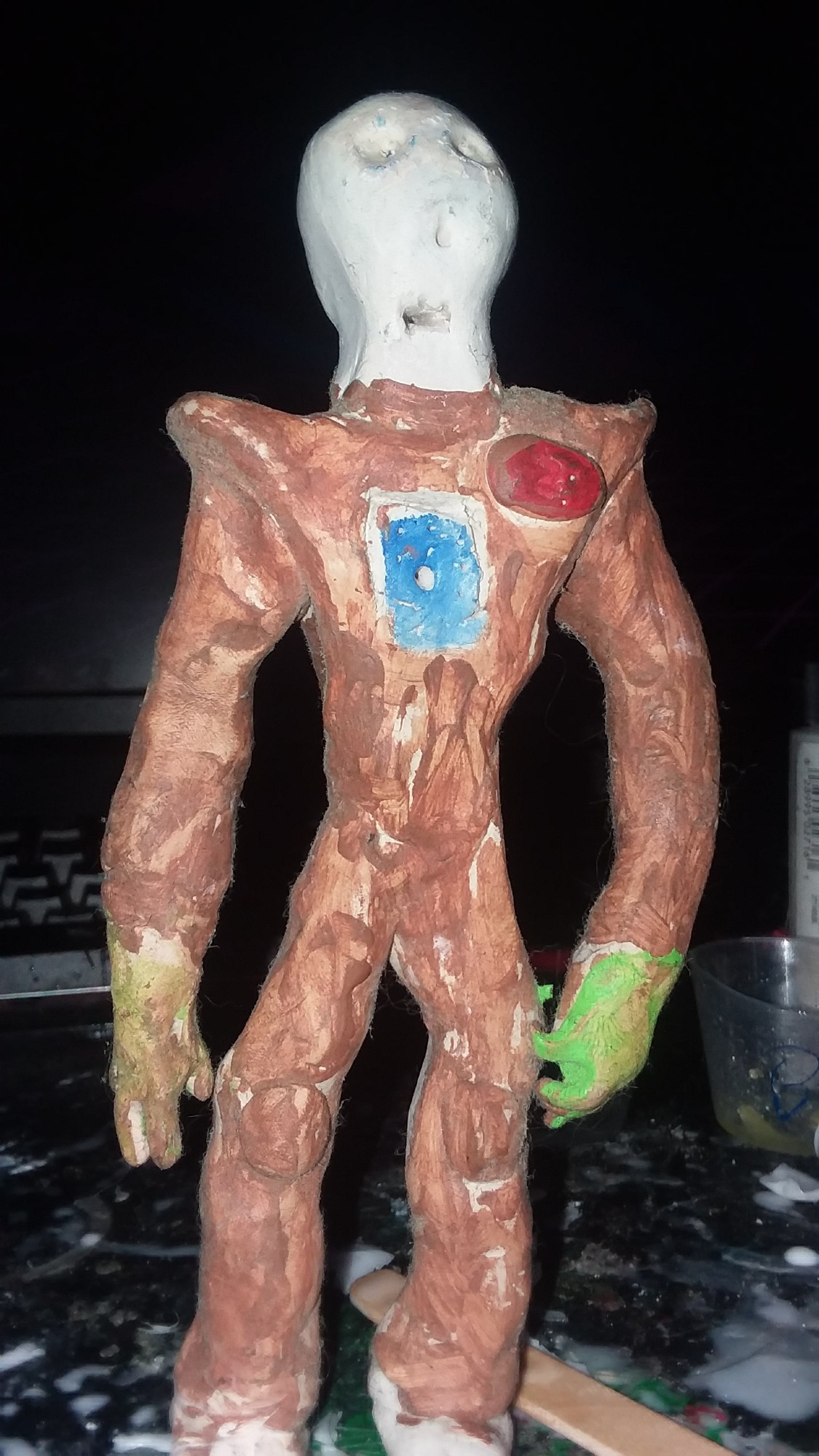 A crude clay necroborg figure from when I was 6-7 years old. Made from some generic kids clay. Painted sloppily with acrylics.