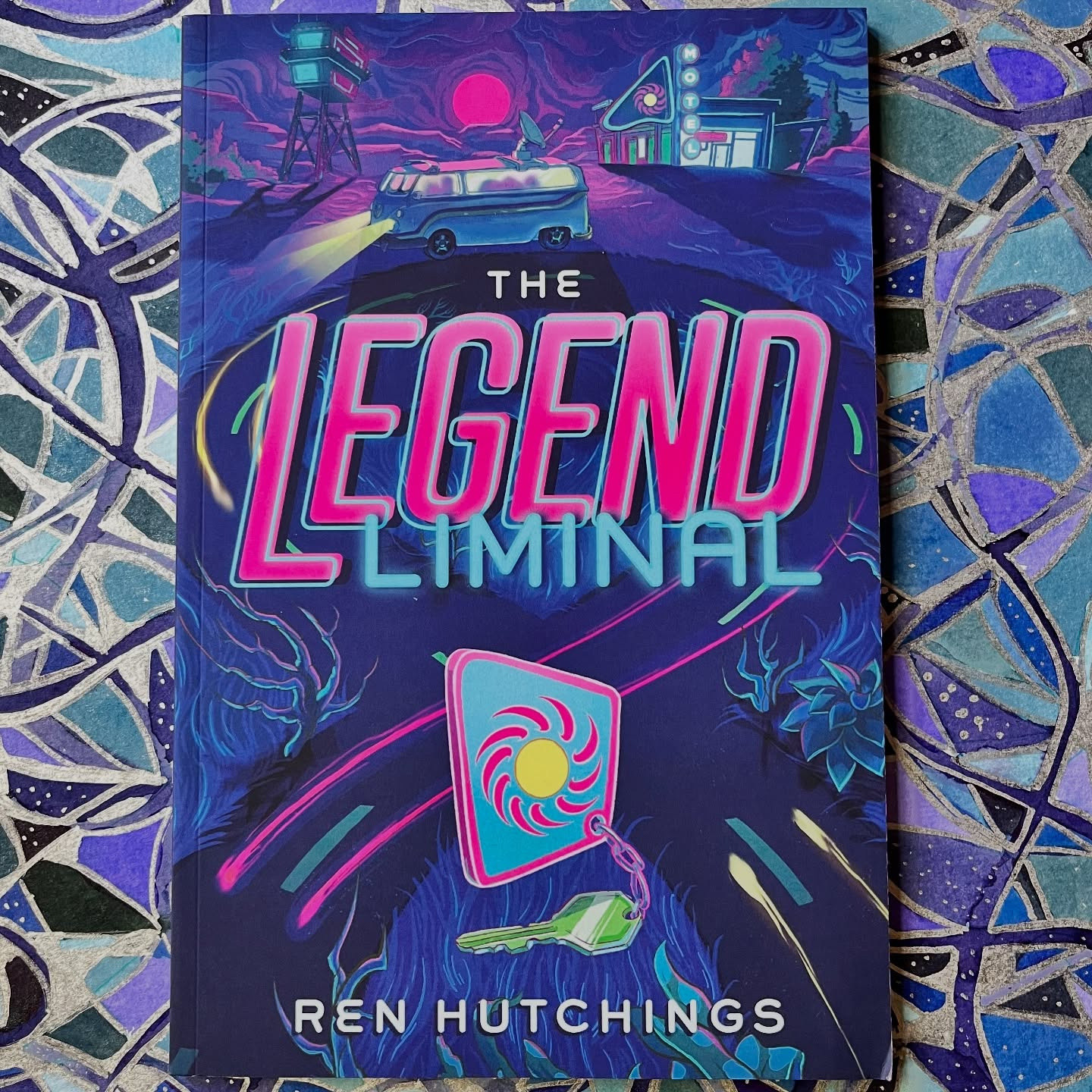The Legend Liminal by Ren Hutchings, cover art by Kim Herbst.
Background abstract mixed media art by Jendia Gammon.