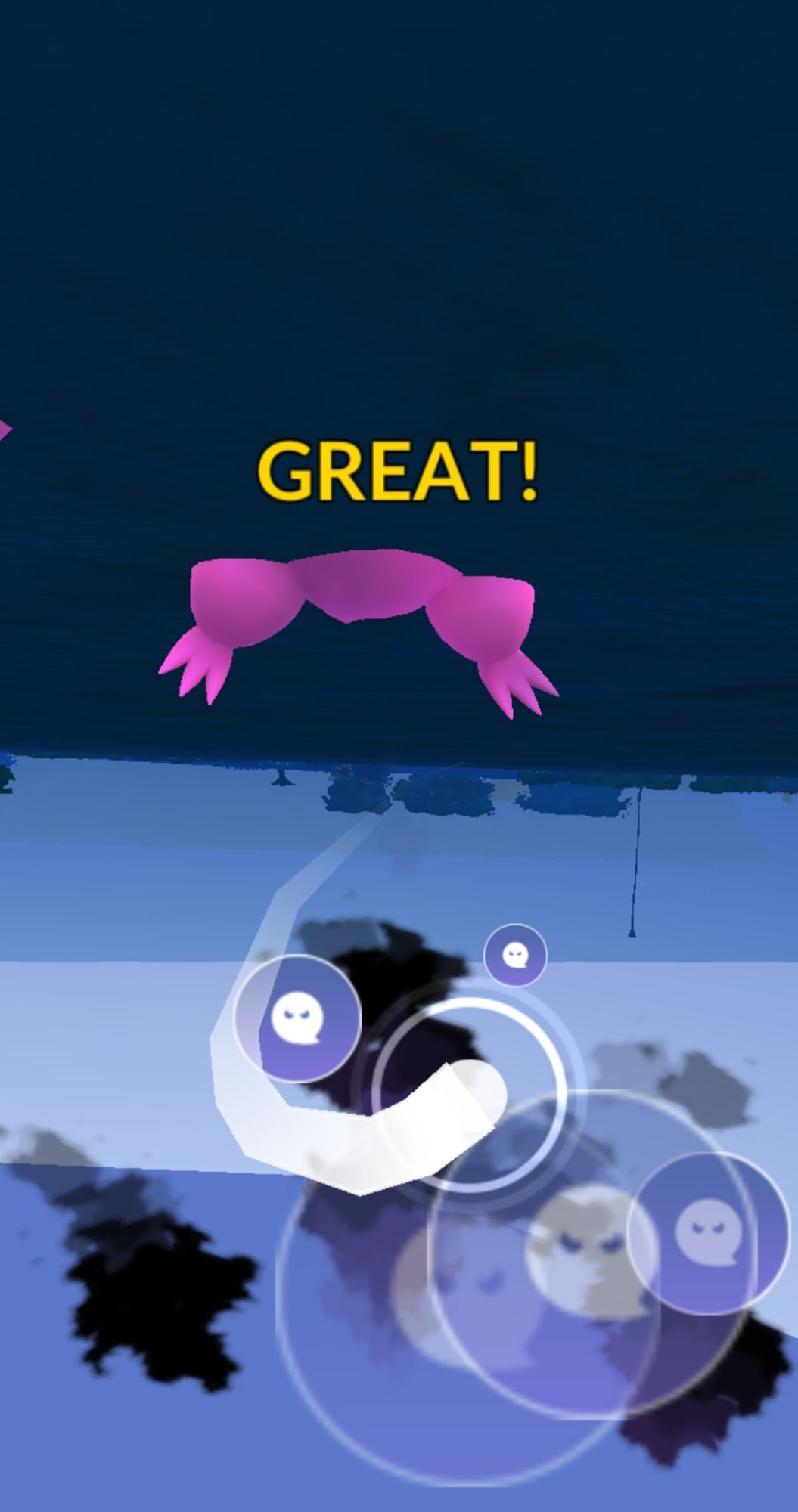 A screenshot from Pokemon Go that shows the game glitching spectacularly. I was fighting Giovanni and used a charged attack. Then for whatever reason the view went under the ground layer and my mega Gengar's feet are clipping through. There are also some weird black cloudy shapes and some other things clipping through the ground in the distance.