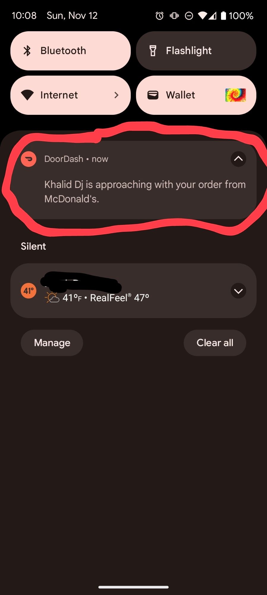 A screenshot of a Door Dash notification. The Dasher's name is Khalid DJ.