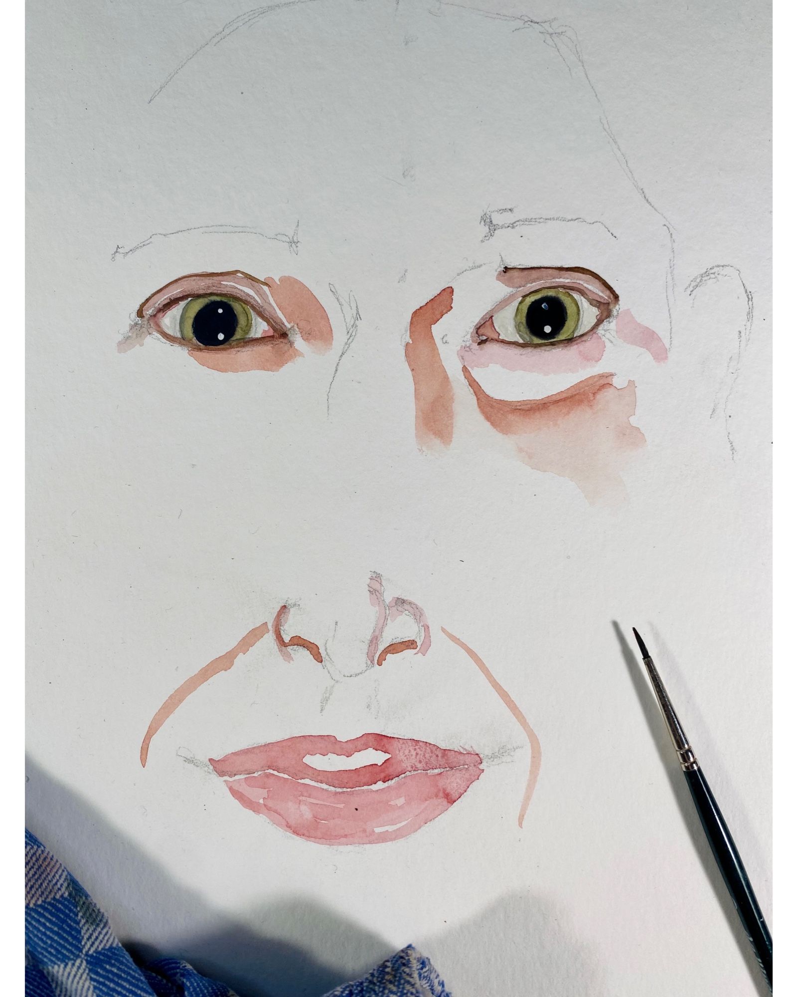 work in progress of a commissioned portrait. hints of pink as nose and lips. The green eyes already very awake.