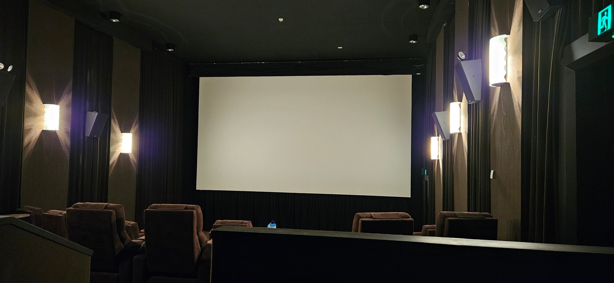Cinema screen and recliner chairs