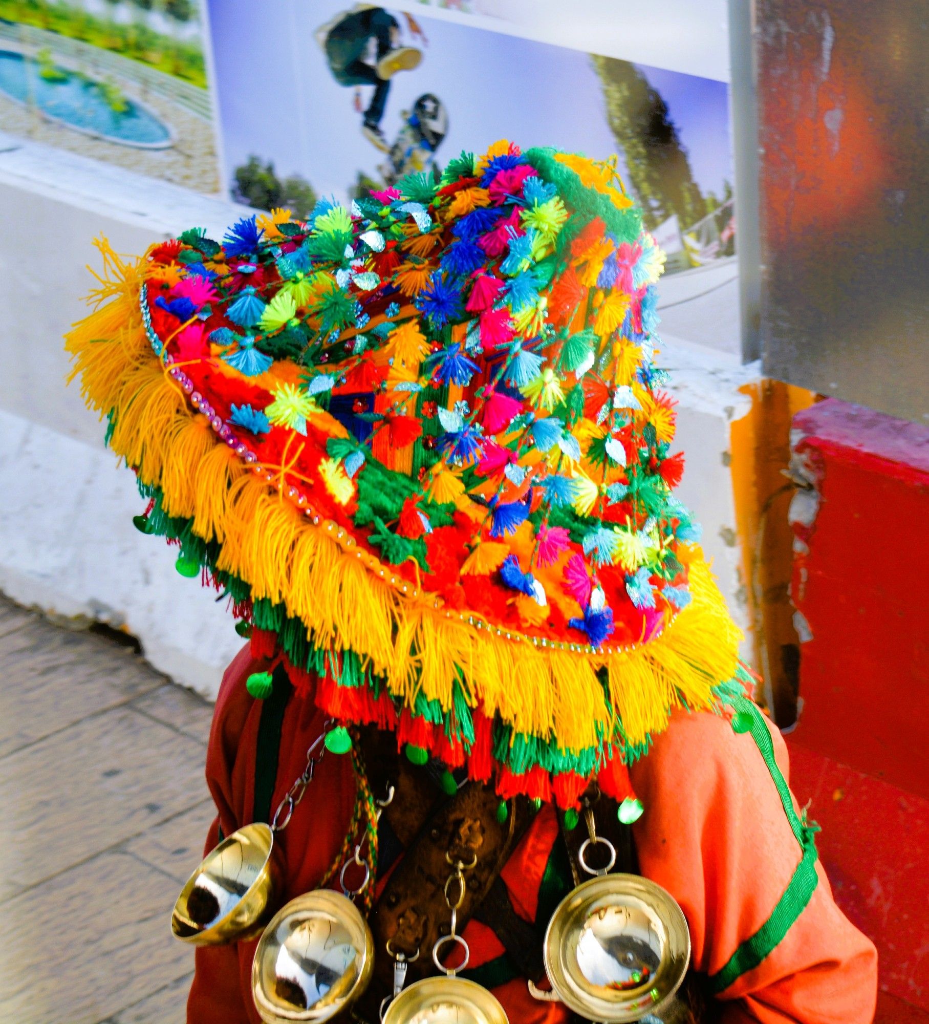 A garrab wears a red djellaba, and a matching large ornate hat that looks like your great aunt Ethel's lampshade. He carries a goatskin bag with cold fresh water, and brass cups to serve water.