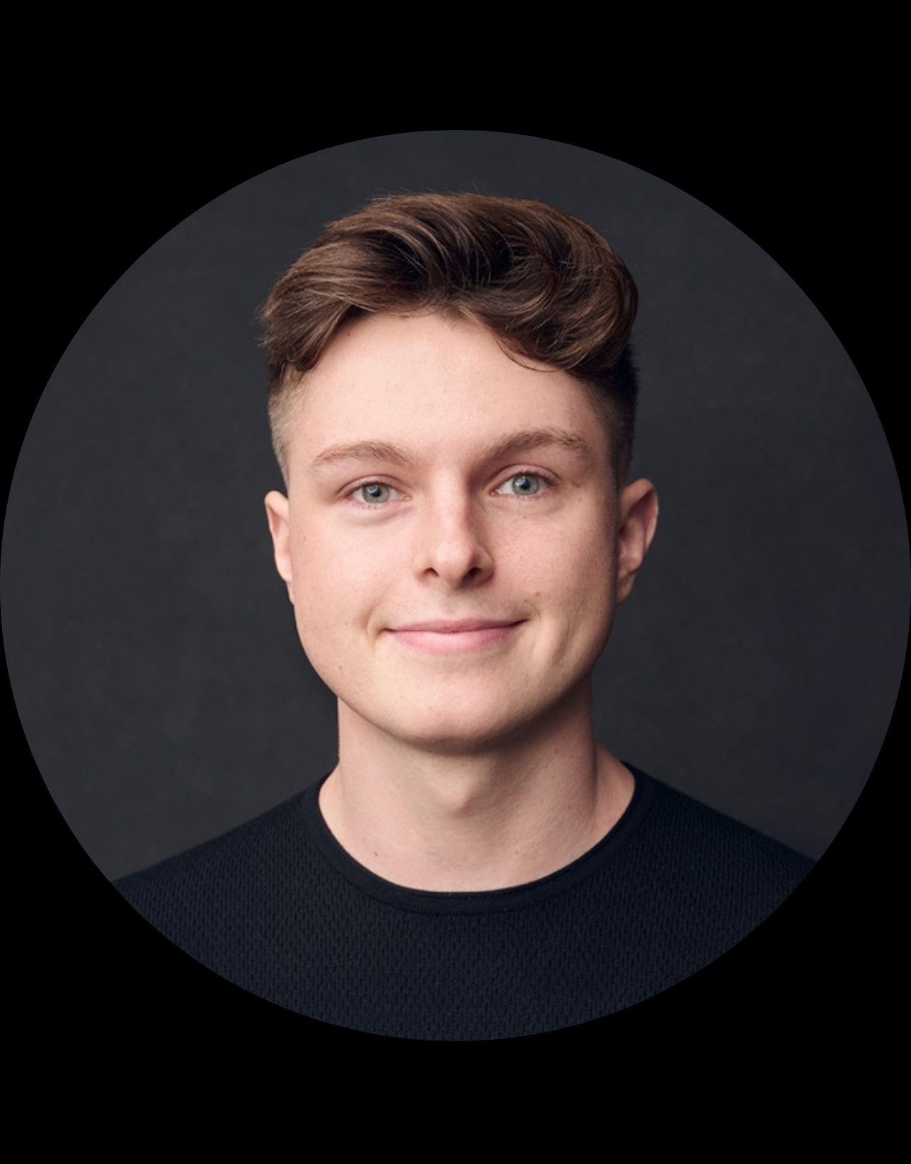 Photo of Nate Cavanaugh, the twenty-something DOGE affiliate who is the new acting president of USIP. He is a young white man with brown hair and blue eyes. He’s wearing a black shirt and smiling at the camera. 