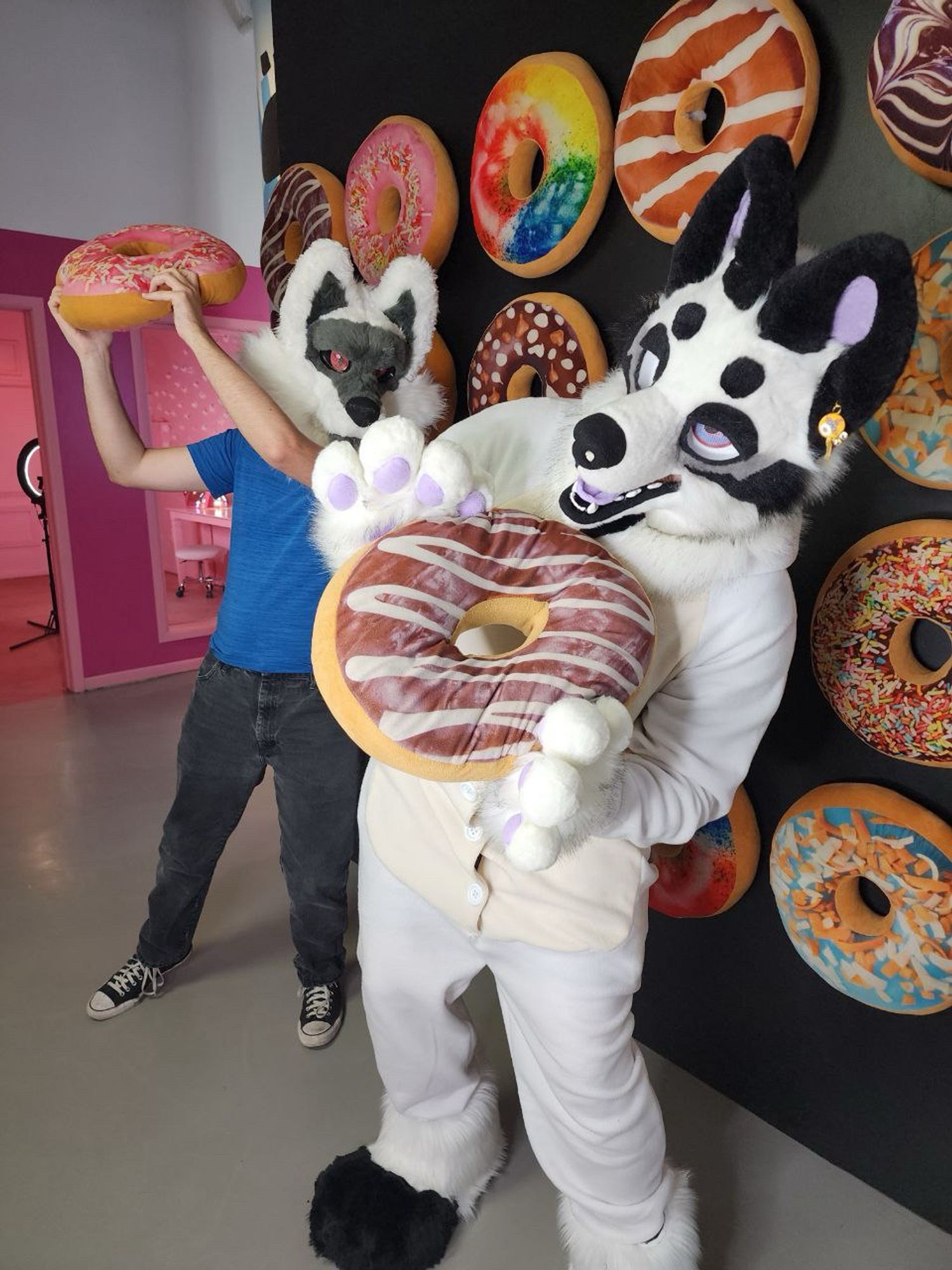 Me slapping my friend with a giant donut