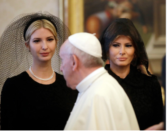 Ivanka and Melania wearing veils when meeting Pope Francis at the Vatican.