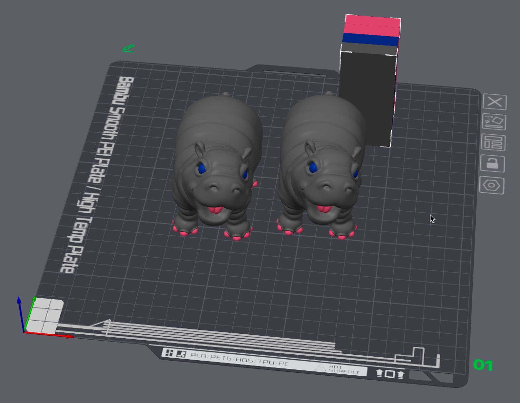 Bambu Labs Build plate rendering of 2 models of Moo Deng the baby pymgy hippo.