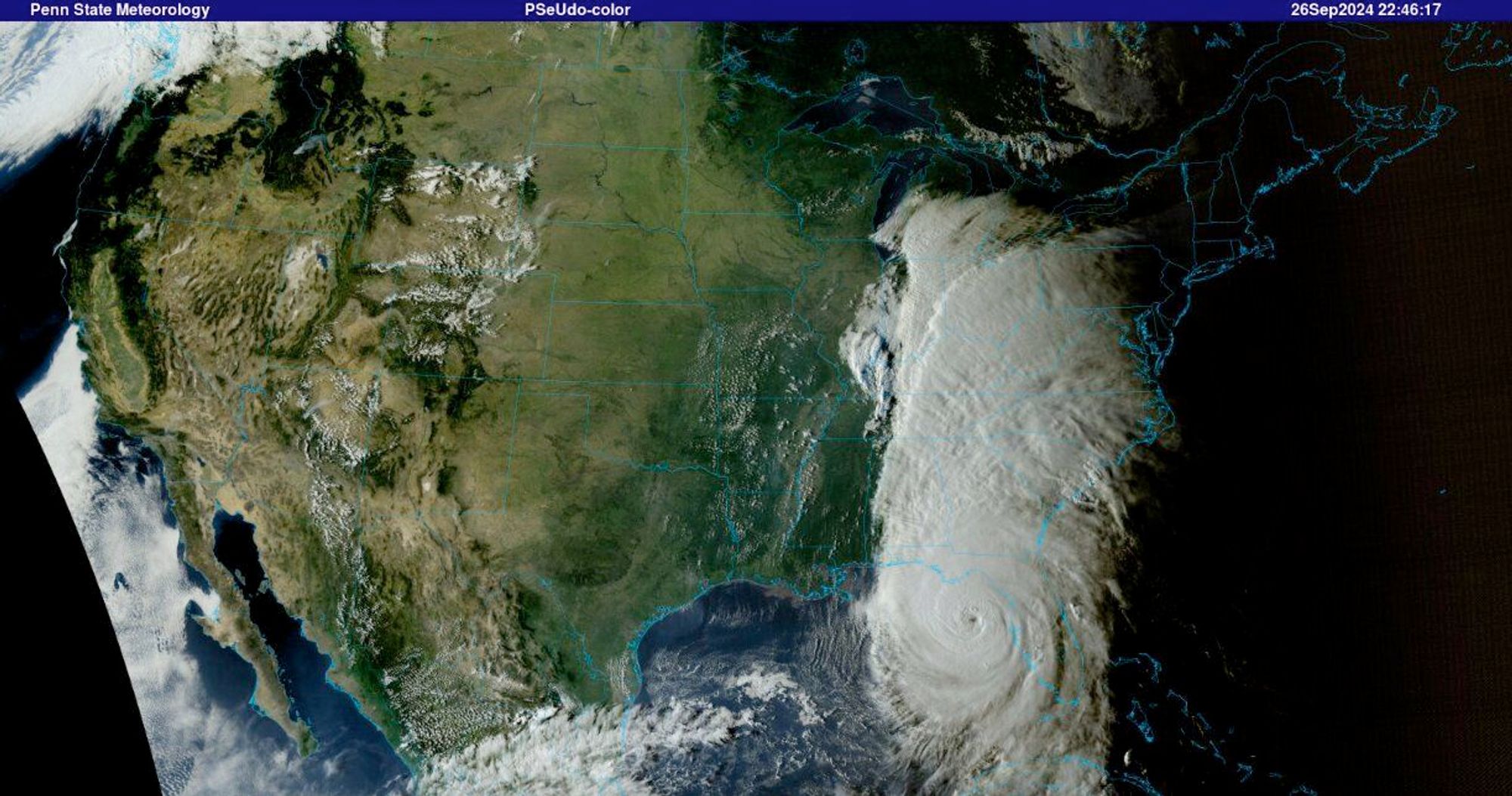 Satellite view of the US, with the hurricane and other storms connected from the Gulf Coast to the Canadian border...