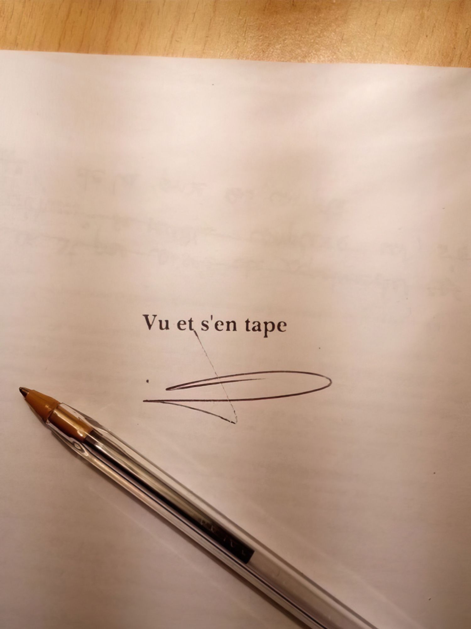 Papier sur lequel est écrit "Vu et s'en tape" avec une signature.