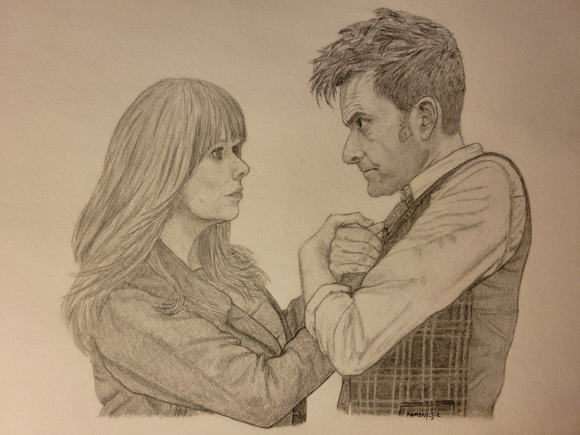 Graphite drawing inspired by a scene in the episode of Doctor Who titled 'Wild Blue Yonder'. The Fourteenth Doctor grasps Donna Noble's hands tightly to his chest while staring into her eyes. He is promising that he will get her home to her family.