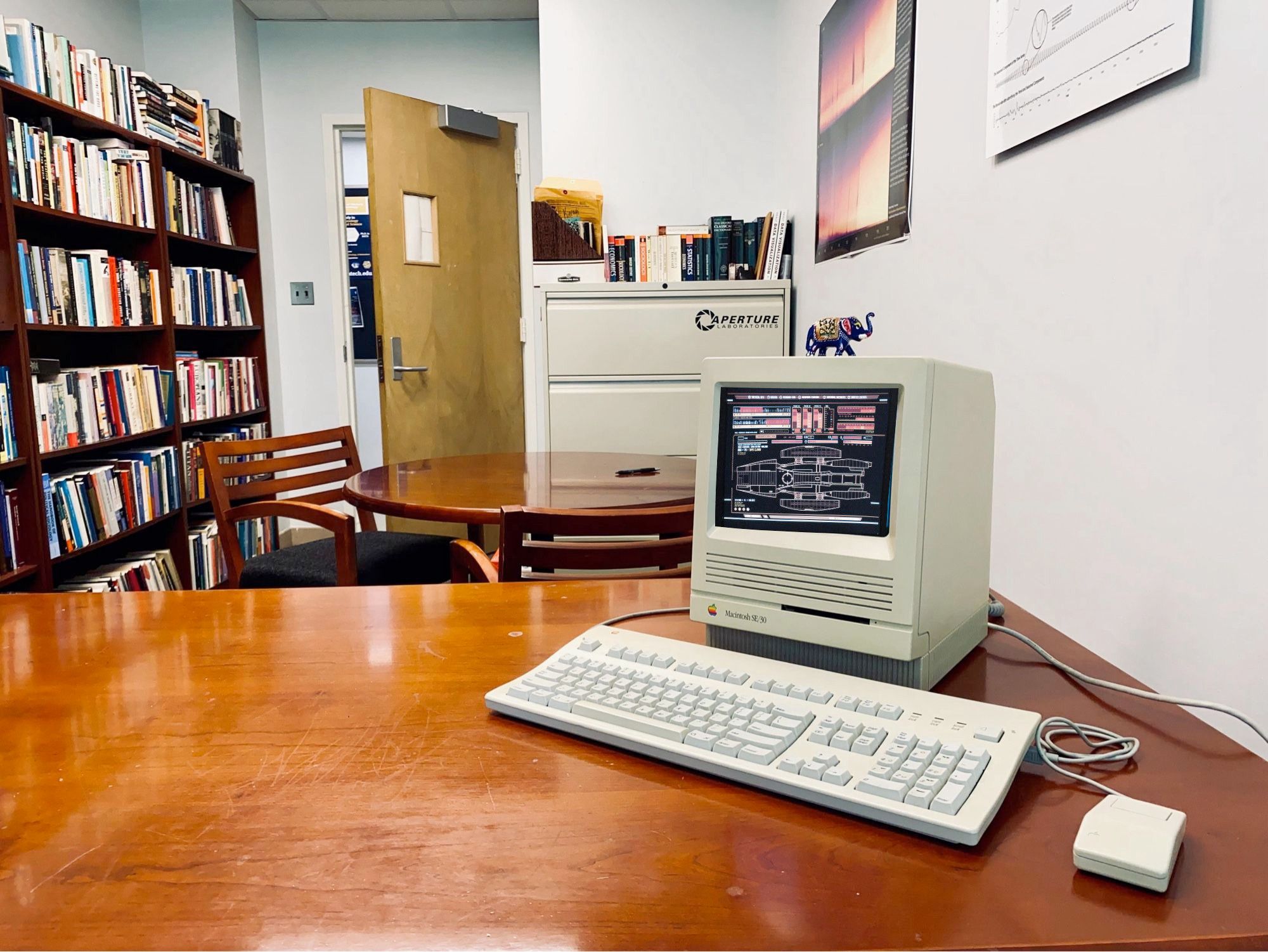 Classic Mac showing the master systems display of the Battlestar Galactica. The Galactica survived because of the low tech, non-networked computer systems that couldn't be infiltrated by the Cylons.