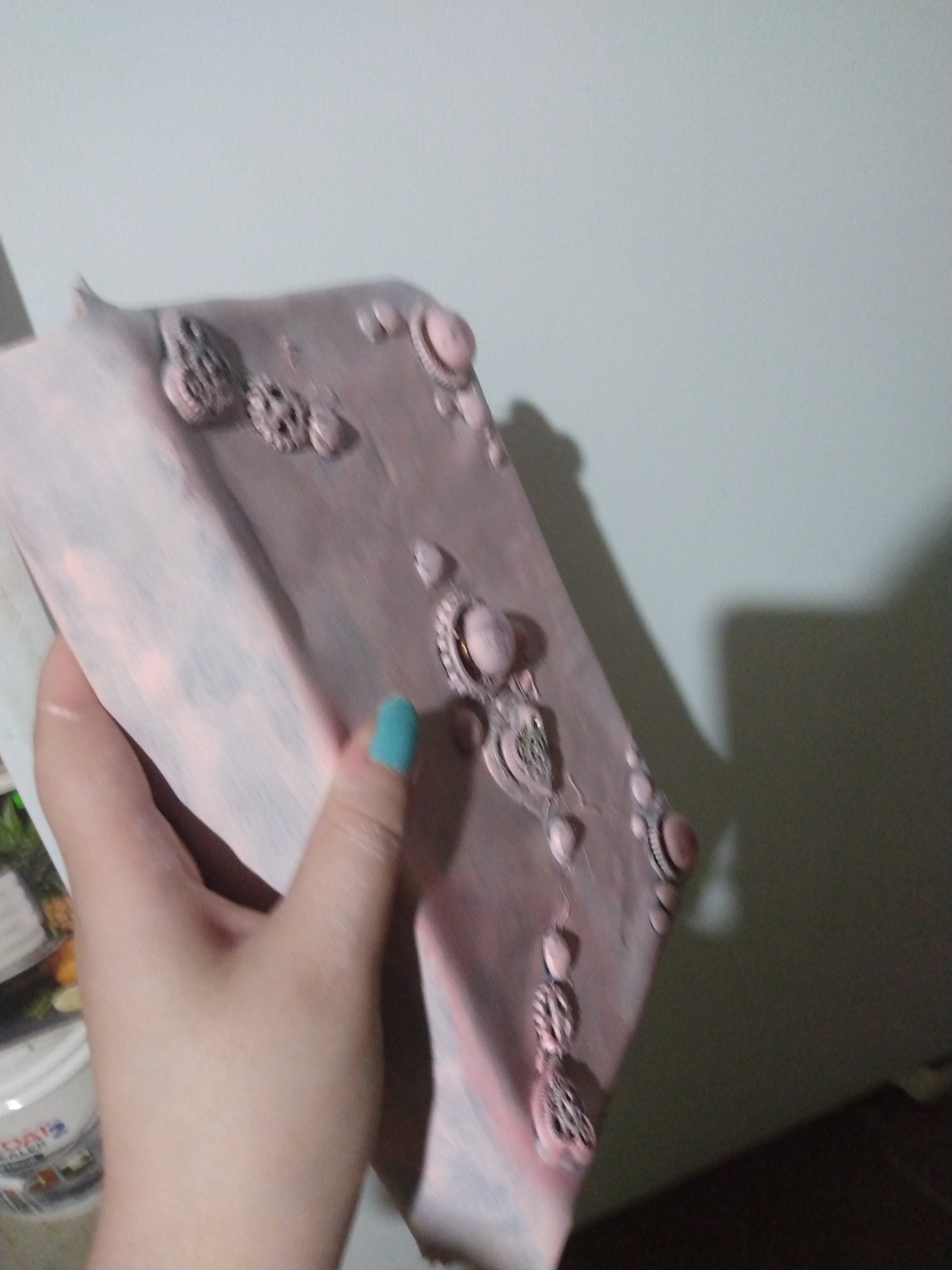 A pink leather bound steampunk spellbook