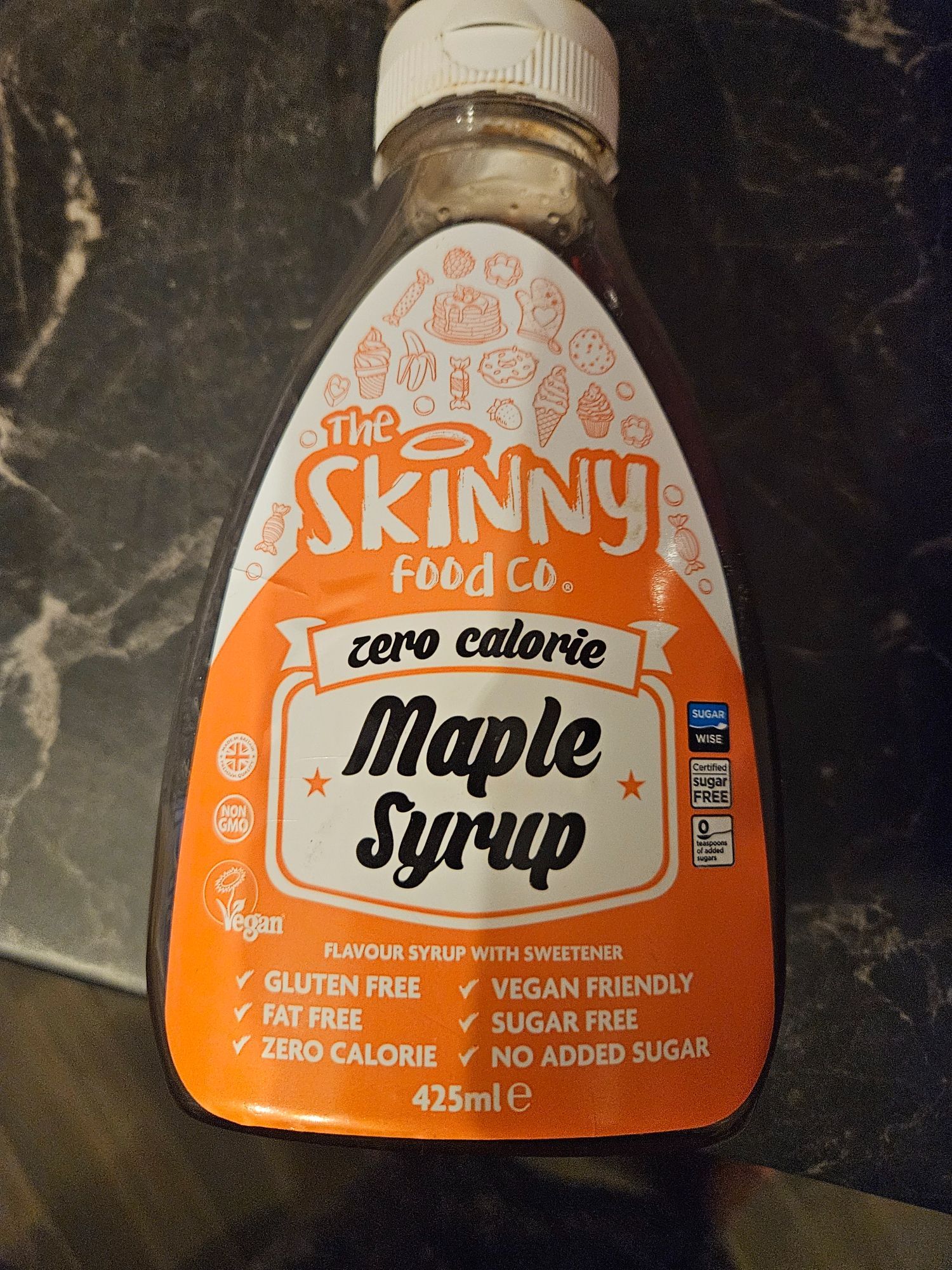 Bottle labeled the skinny food Co zero calorie maple syrup