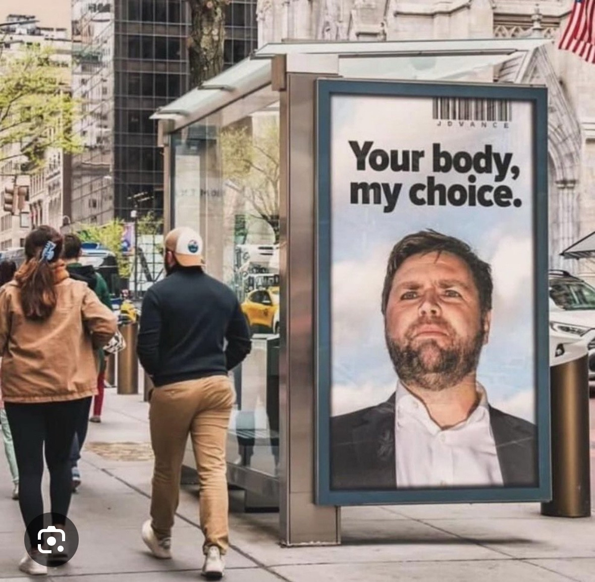 jD Vance on a “Your body, my choice.” poster 