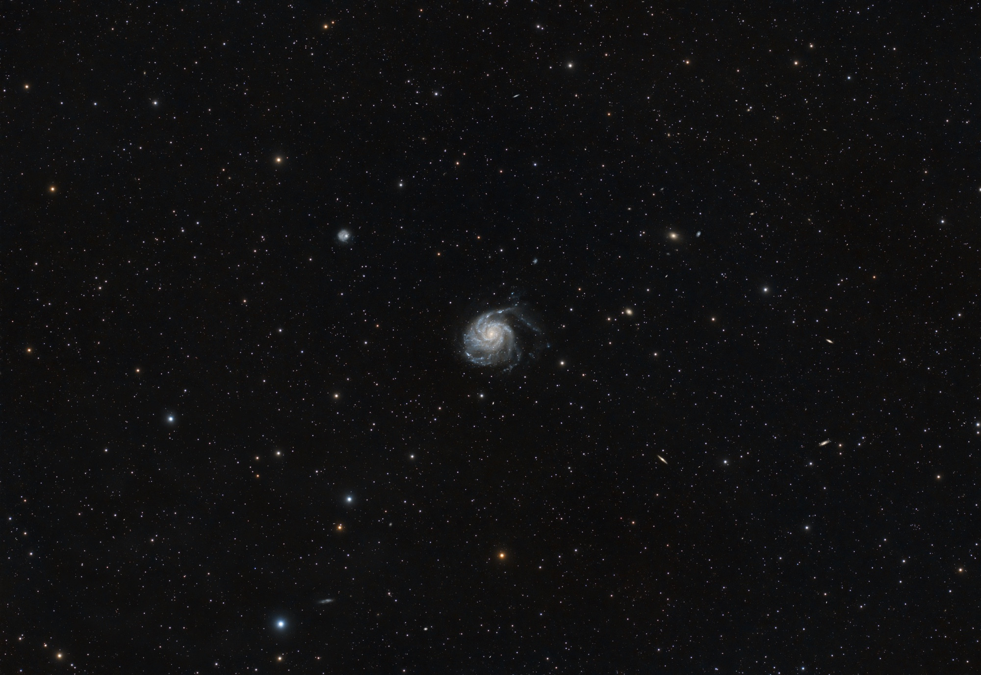 A tiny looking spiral galaxy with not much around it. There’s a stars but these are in the foreground in our galaxy.