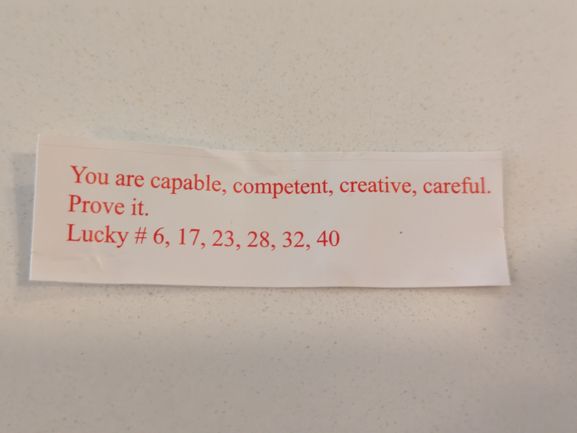 Fortune cookie fortune saying "You are capable, competent, creative, careful. Prove it."