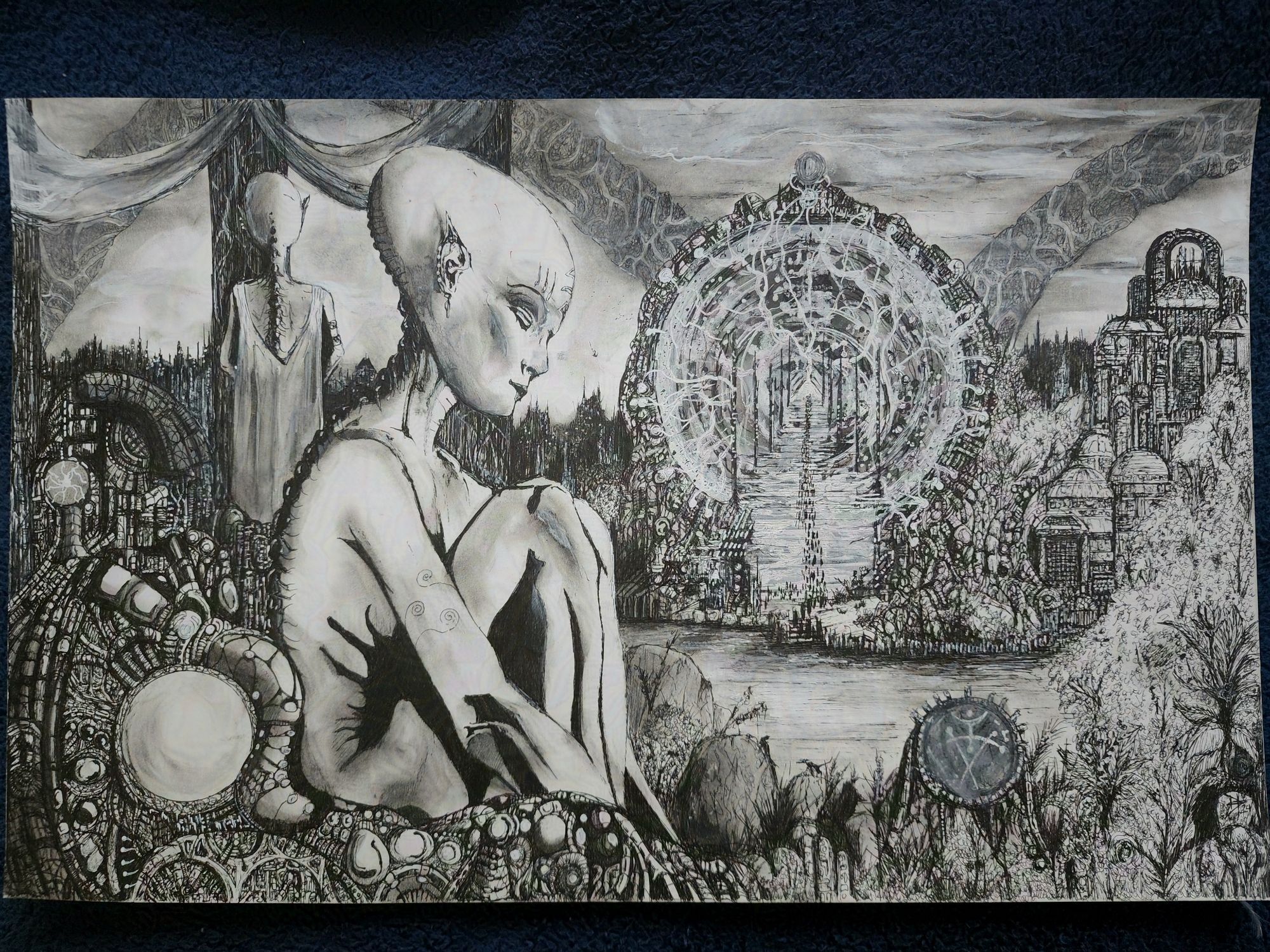 Pen drawing of an elongated skull humanoid sitting in a techno-organic construct across from an expanse of water from a large glowing portal ringed by machinery with a procession of beings entering/leaving it from some buildings on that are showing through the vegetation on that far bank and the close one. A second figure is staring past some pillars towards the horizon and the faint, far off arcs of some megastructures ringing the world.