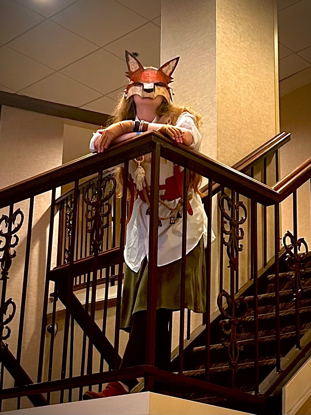 Yaleokre inspired cosplay with fox mask photo taken on a staircase