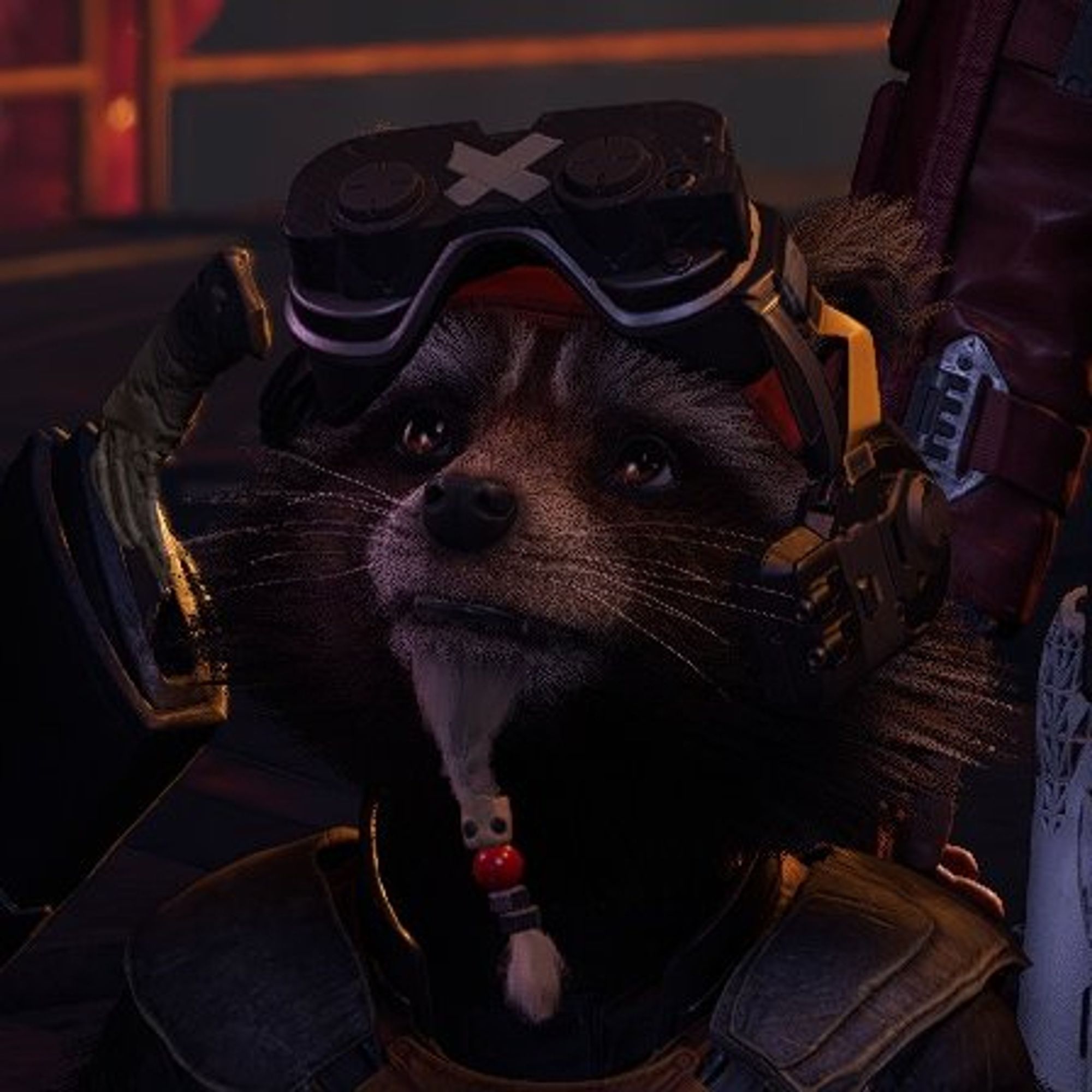 Rocket Raccoon in Eidos-Montreal's Guardians of the Galaxy game. He's smiling at someone up-left of the camera frame