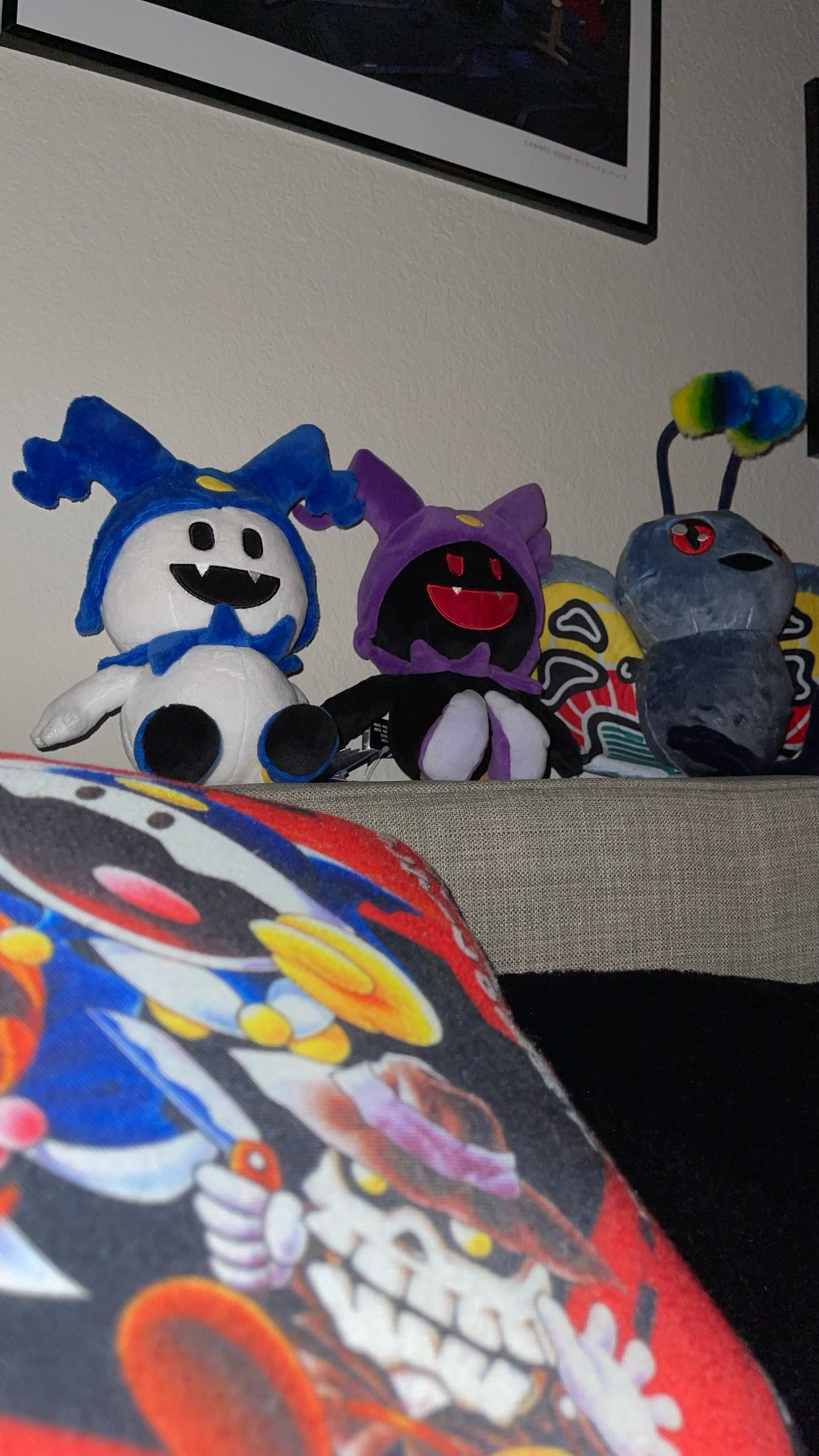 Picture of Shin Megami Tensei character mascots Jack Frost, Jack Black and Mothman plushies.