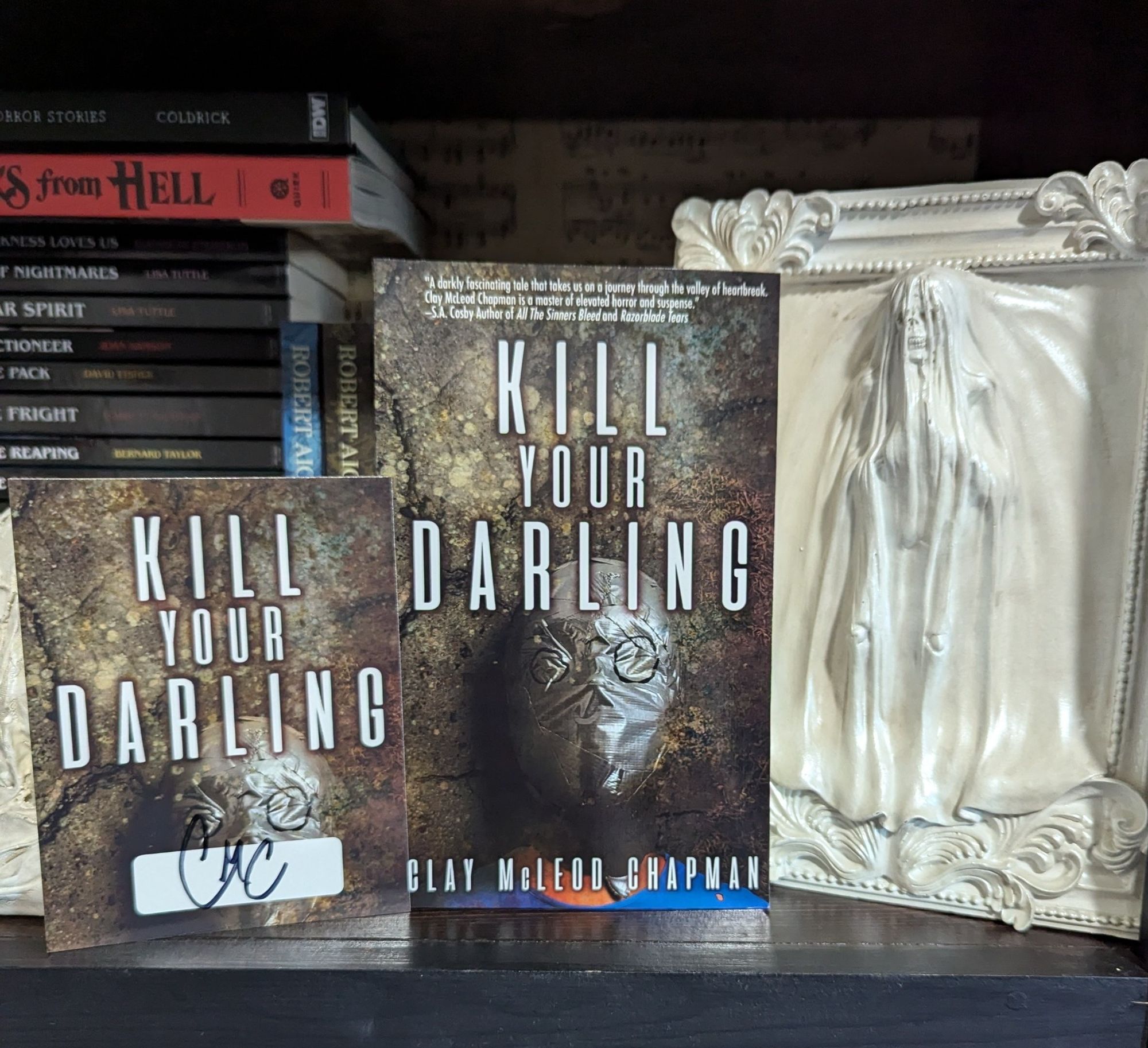 Paperback of KILL YOUR DARLING from Clay McLeod Chapman with a signed card