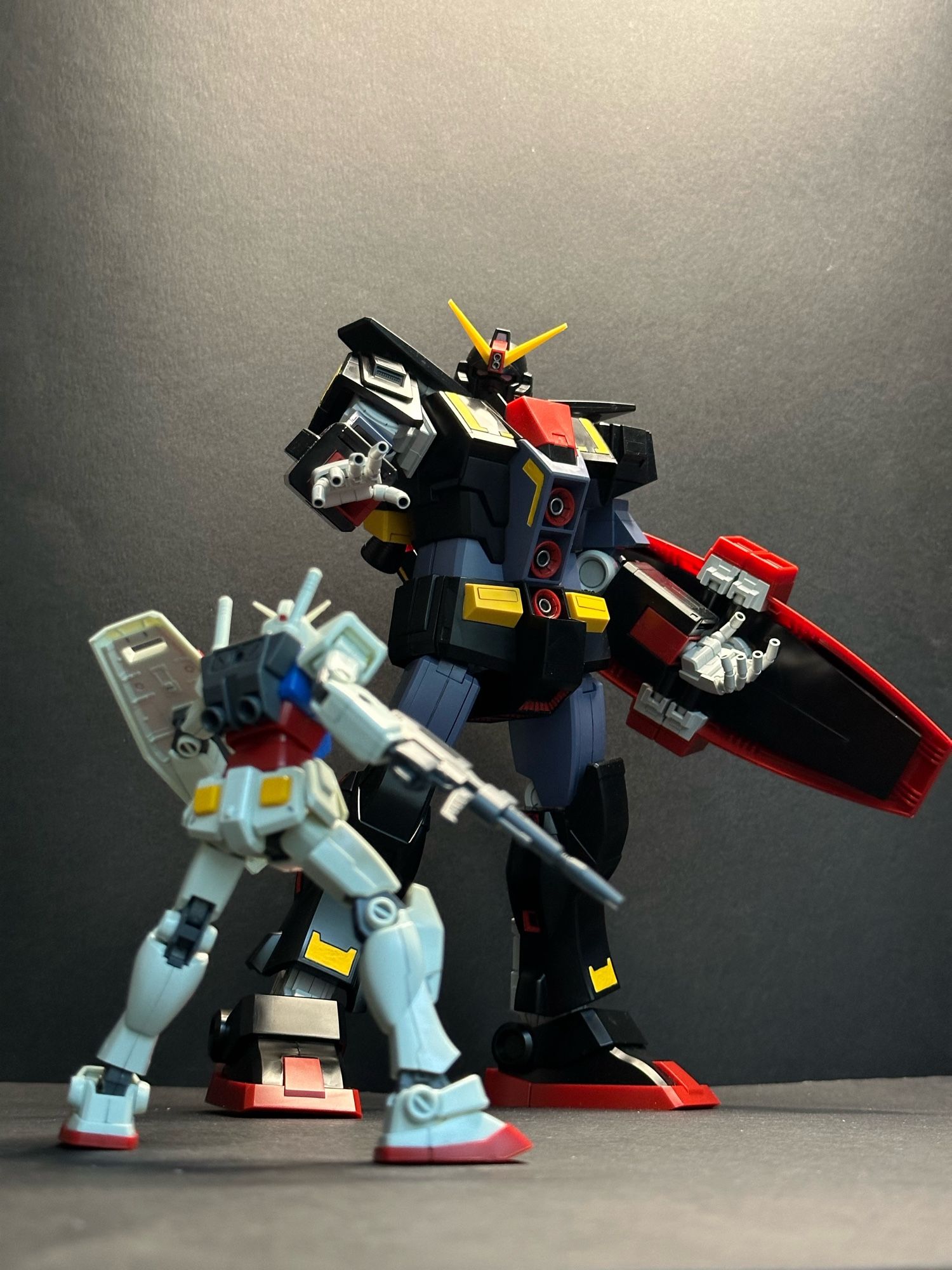 The HGUC Psycho Gundam looming over the HGUC RX-78-2z