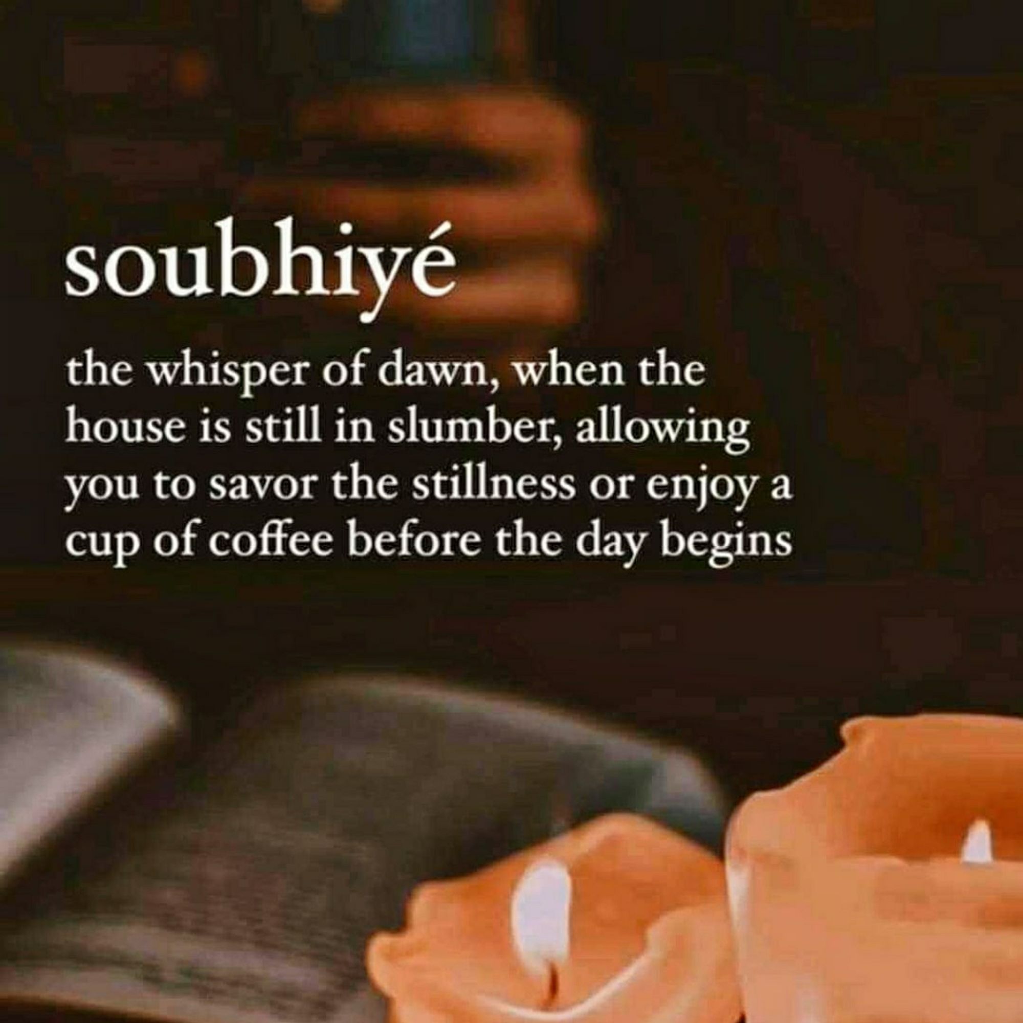 Dark, background graphic of a blurred book and candles. Word, soubhiyé, with the meaning noted as the whisper of dawn, when they have is still in lumber, allowing you to savourz the stillness or enjoy a cup of coffee before the day begins.