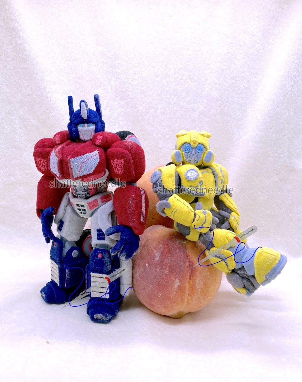 Custom handmade WFC Optimus & movie Bumblebee posed with peaches