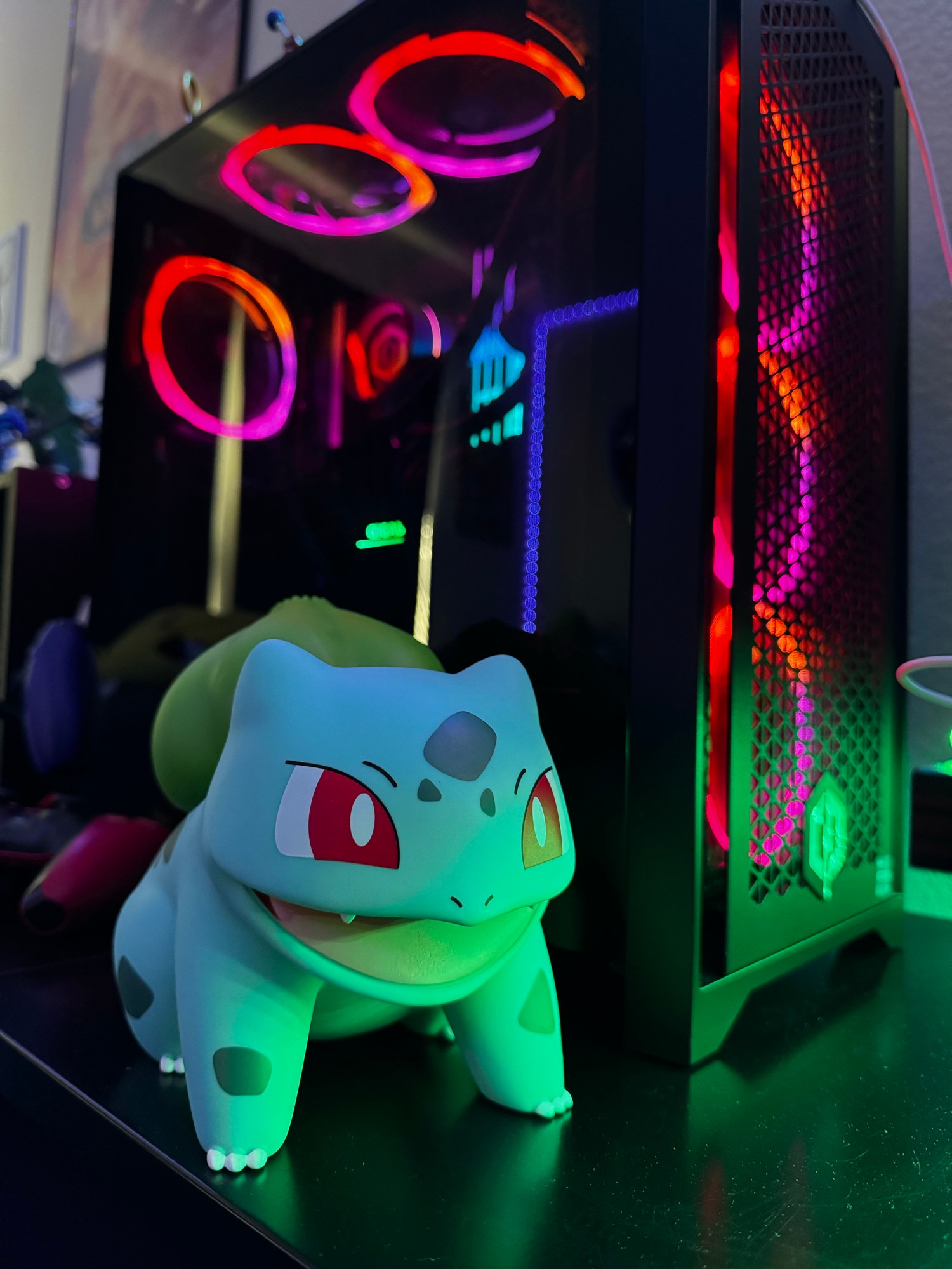 A Bulbasaur guarding a PC. 