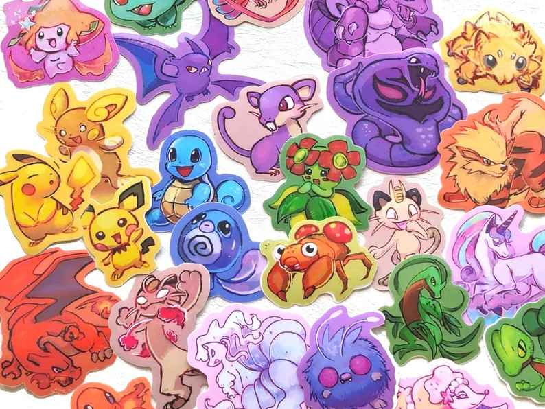 picture of assorted pokemon stickers; stickers are of jirachi, bulbasaur, mega pidgeot, crobat, nidoking, arbok, joltik, pichu, pikachu, raichu, squirtle, poliwag, bellosom, arbok, arcanine, meowth, galarian rapidash, charizard, gigantamax meowth, charmander, alolan ninetales, venonat, shiny primarina, grovyle, and treecko