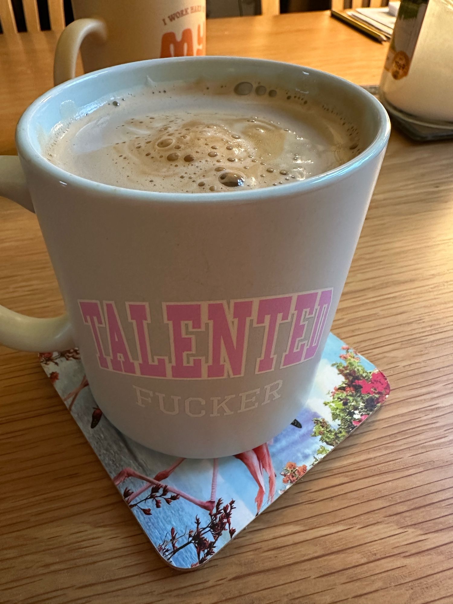 My morning coffee in a “Talented Fucker” mug