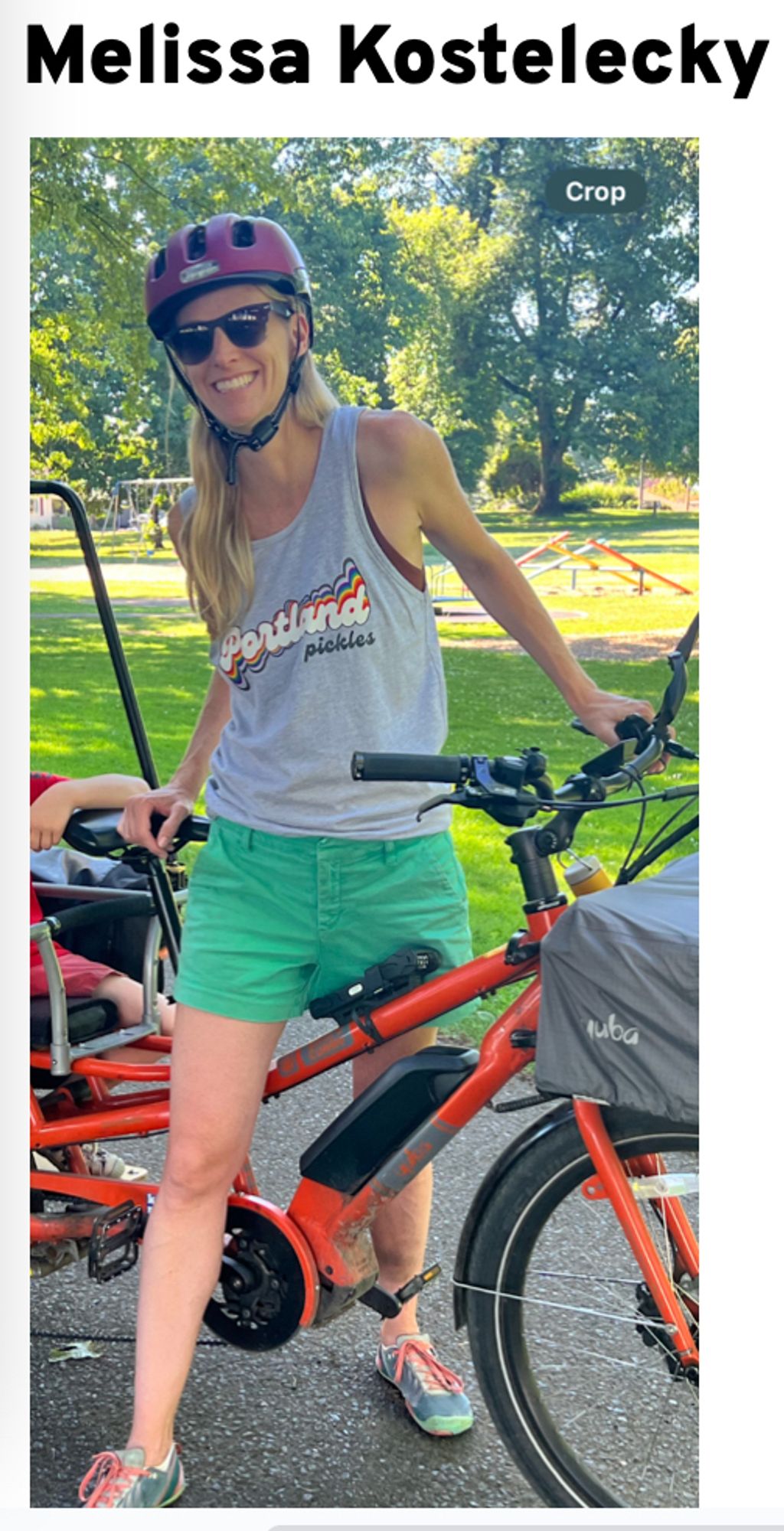 Photo of Melissa Kostelecky with a family bike.