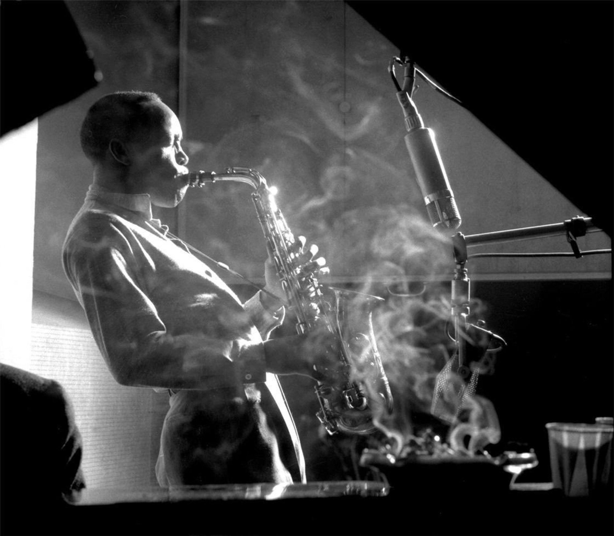 Sonny playing sax in a smoky bar