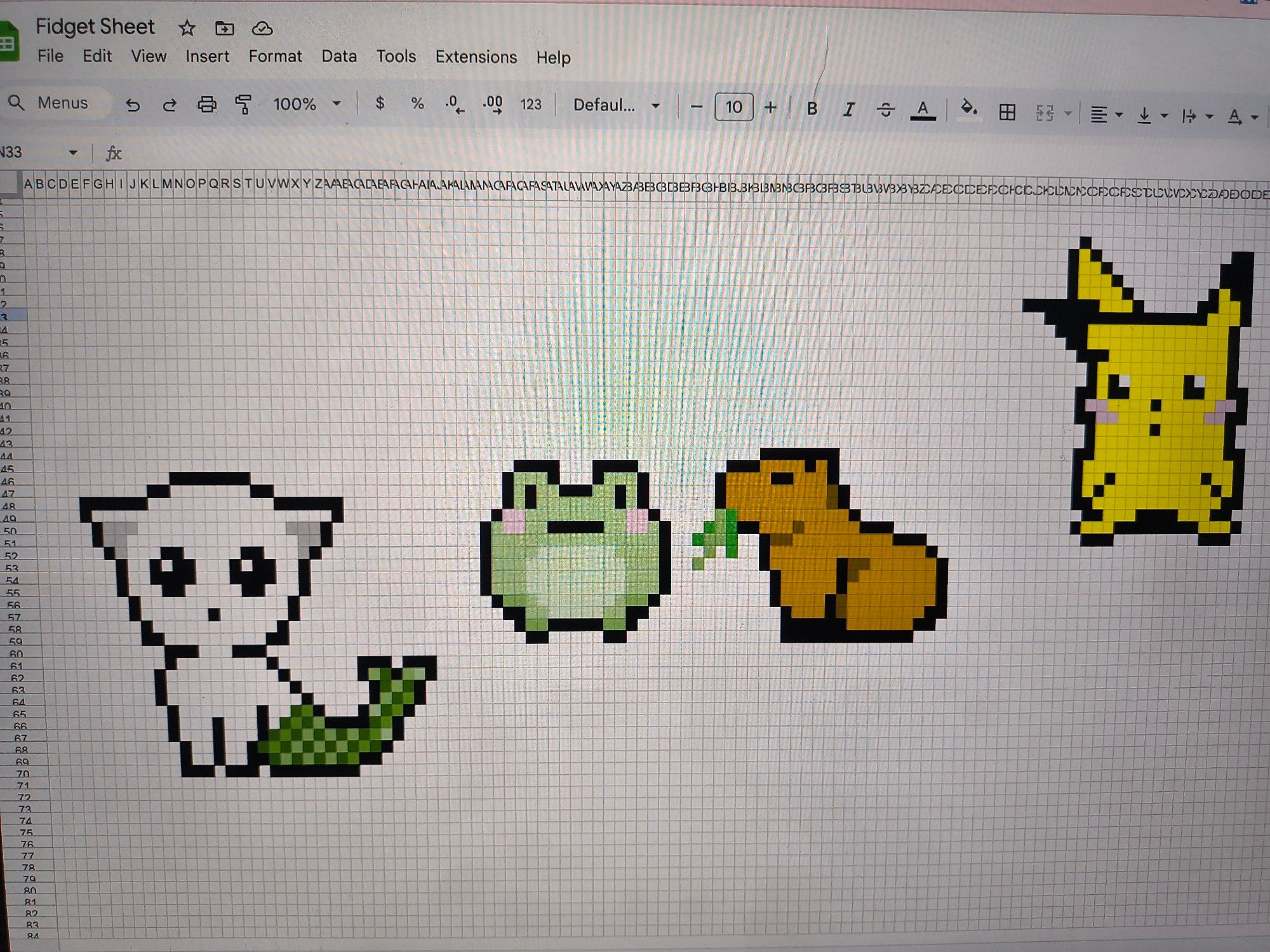 A Google sheet spreadsheet I am using to make little pixel art, featuring a cute little frog guy, it content capybara, a Pikachu, and a cat mermaid/catfish.